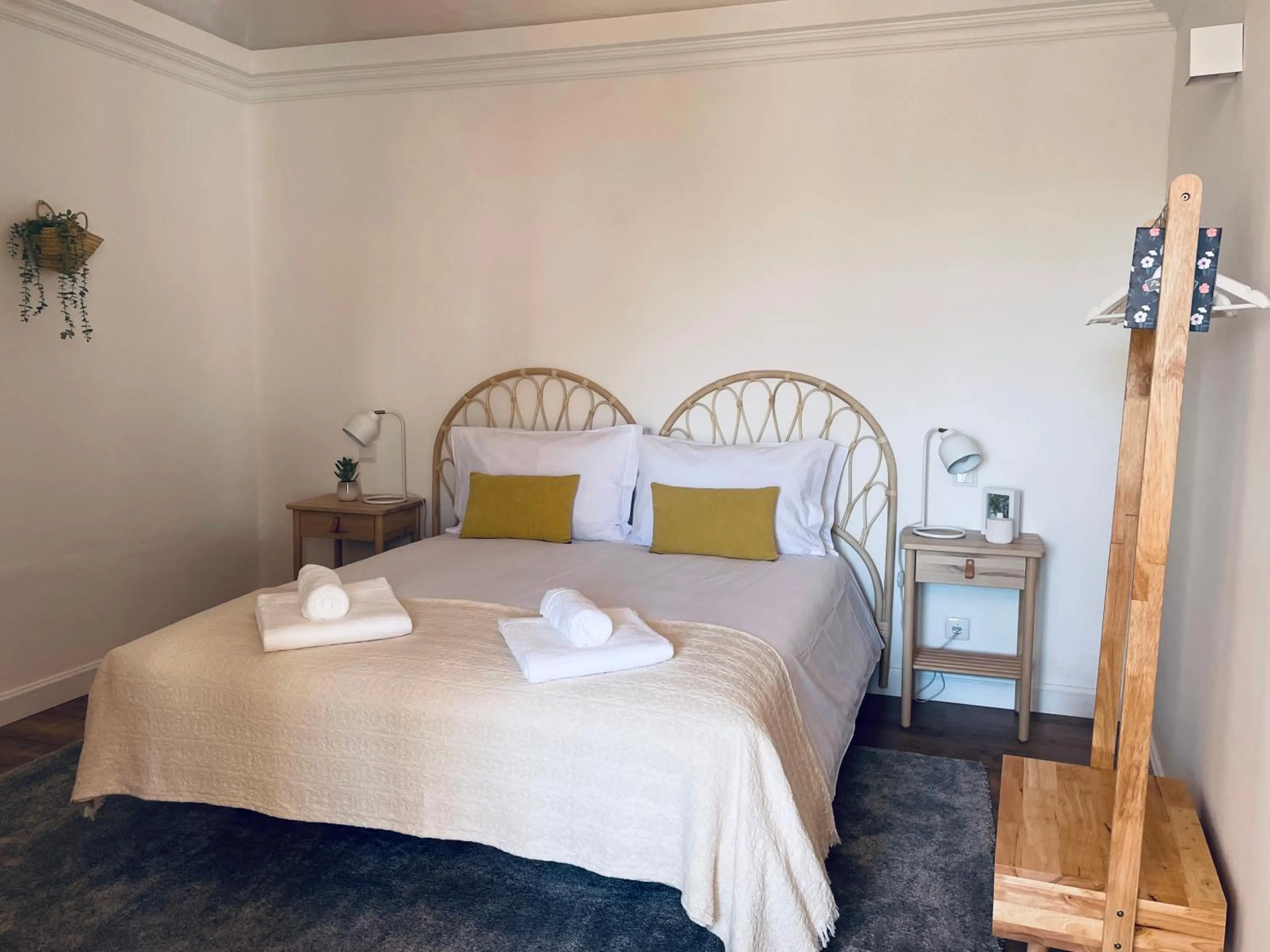 Bed in Casa Soure Suites and Apartments