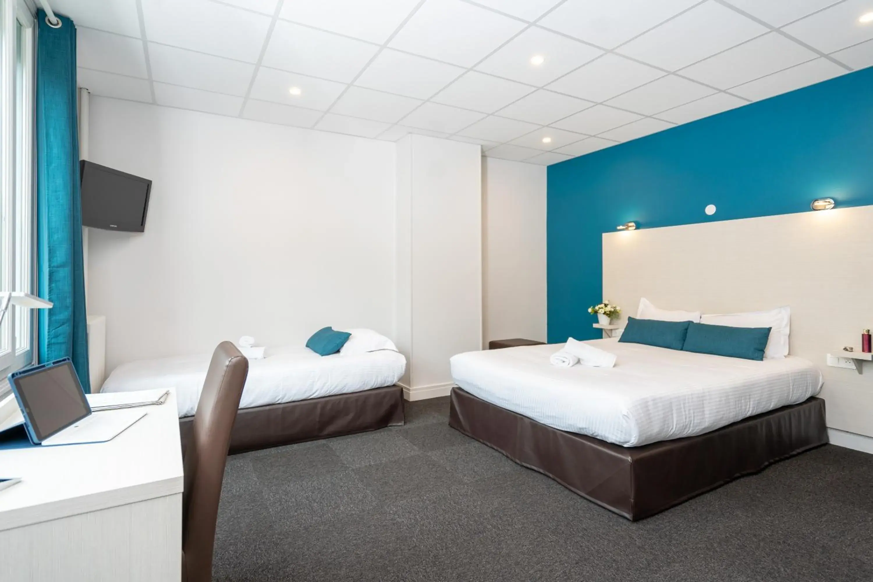 Bed in Logis Hotel Du Chateau Bed in Logis Hotel Du Chateau