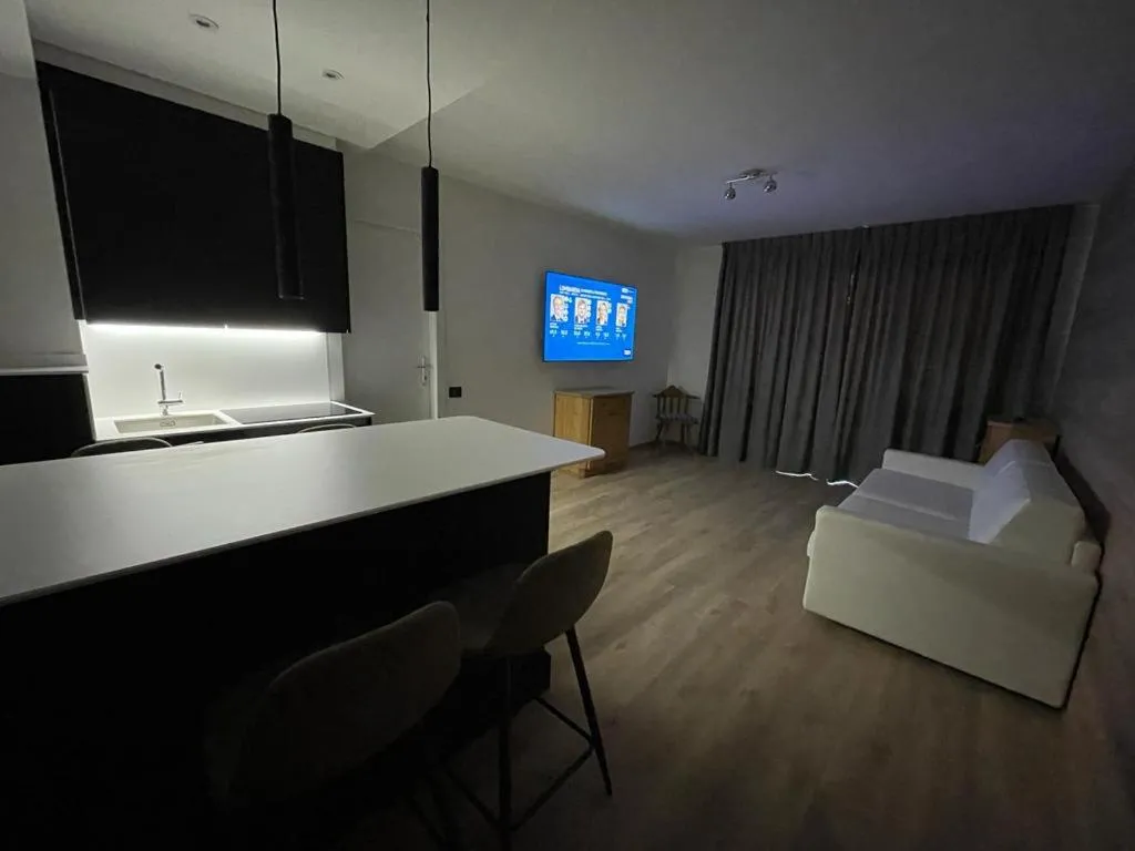 Kitchen or kitchenette, Bed in Appartamento del rosengarten