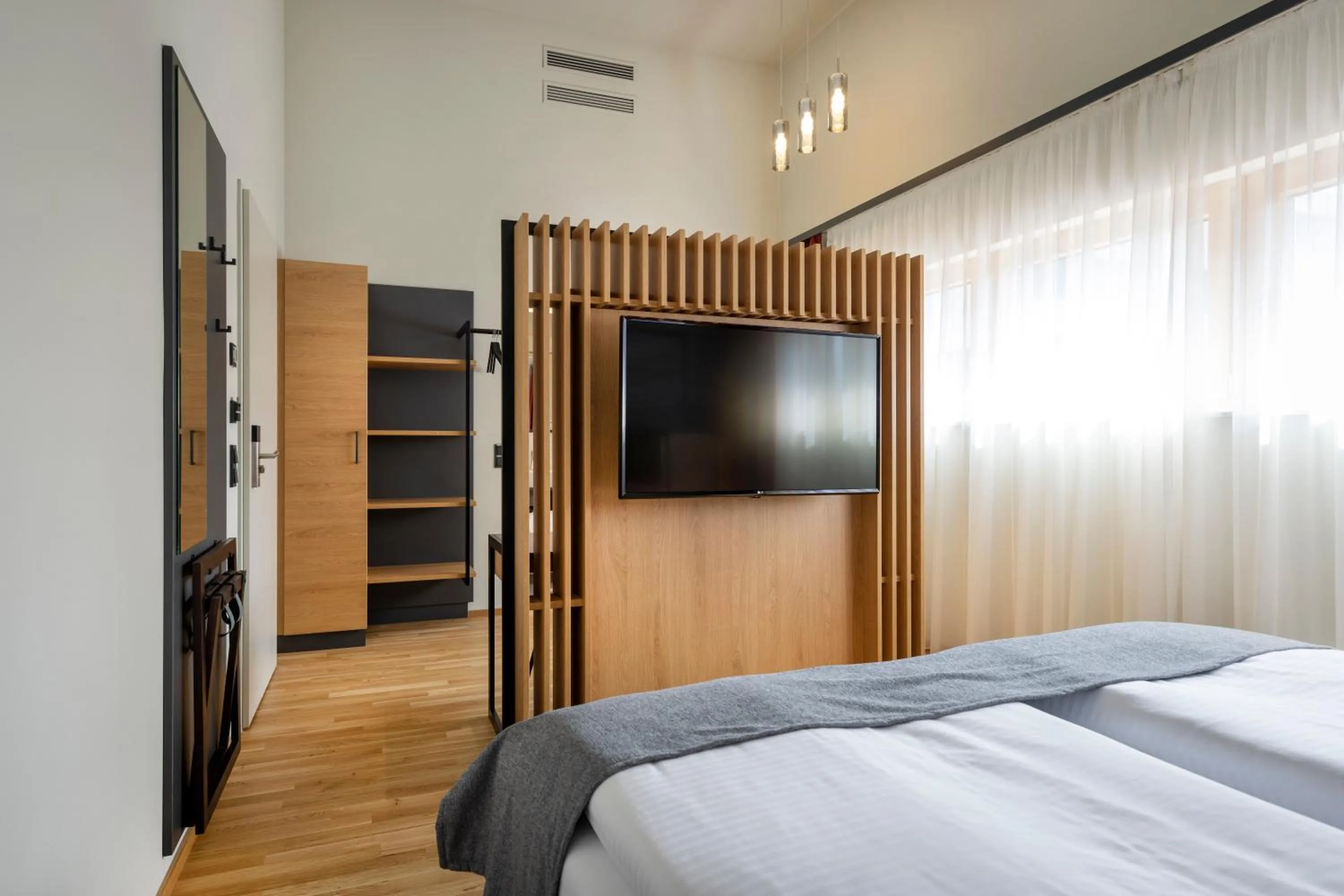 Photo of the whole room, Bed in JUFA Hotel Bregenz