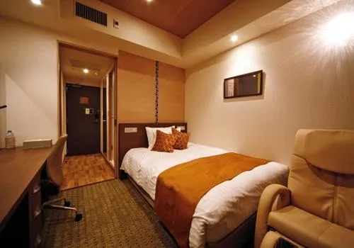 Bed in Hotel Coco Grand