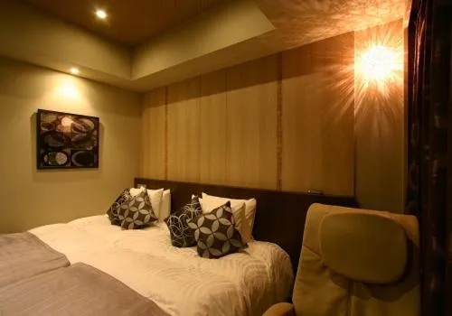 Bed in Hotel Coco Grand