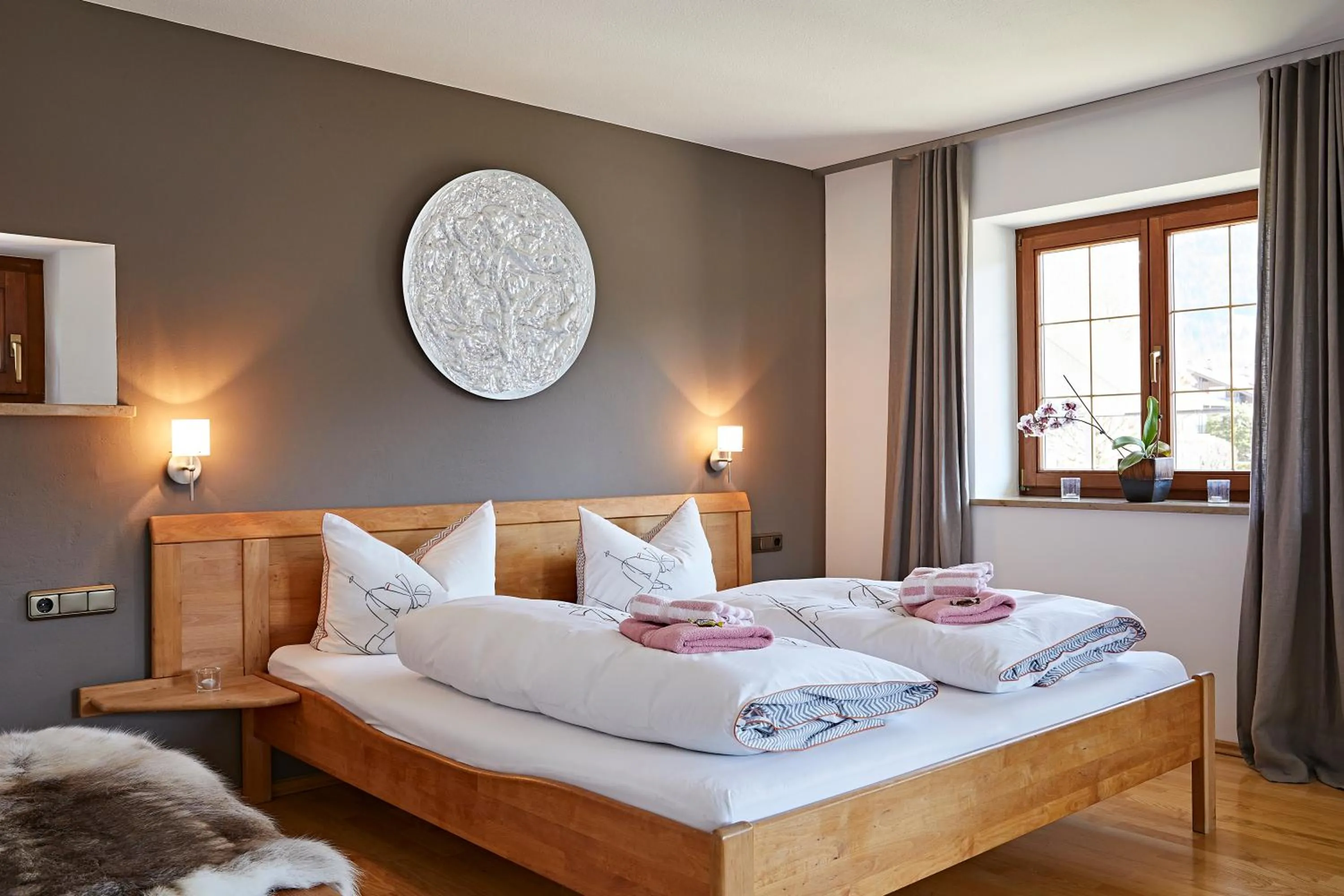Bed in Ferienwohnungen Schwendinger