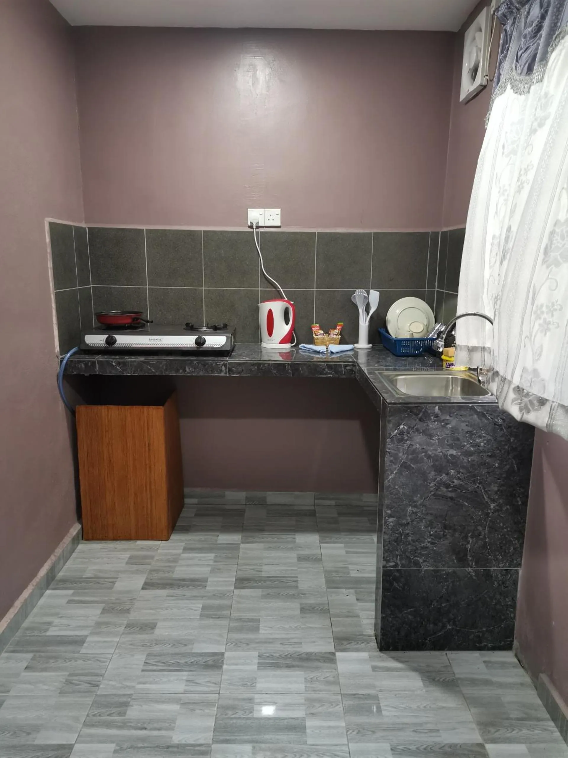 Bedroom in OYO Home 90348 Inspire Rooms