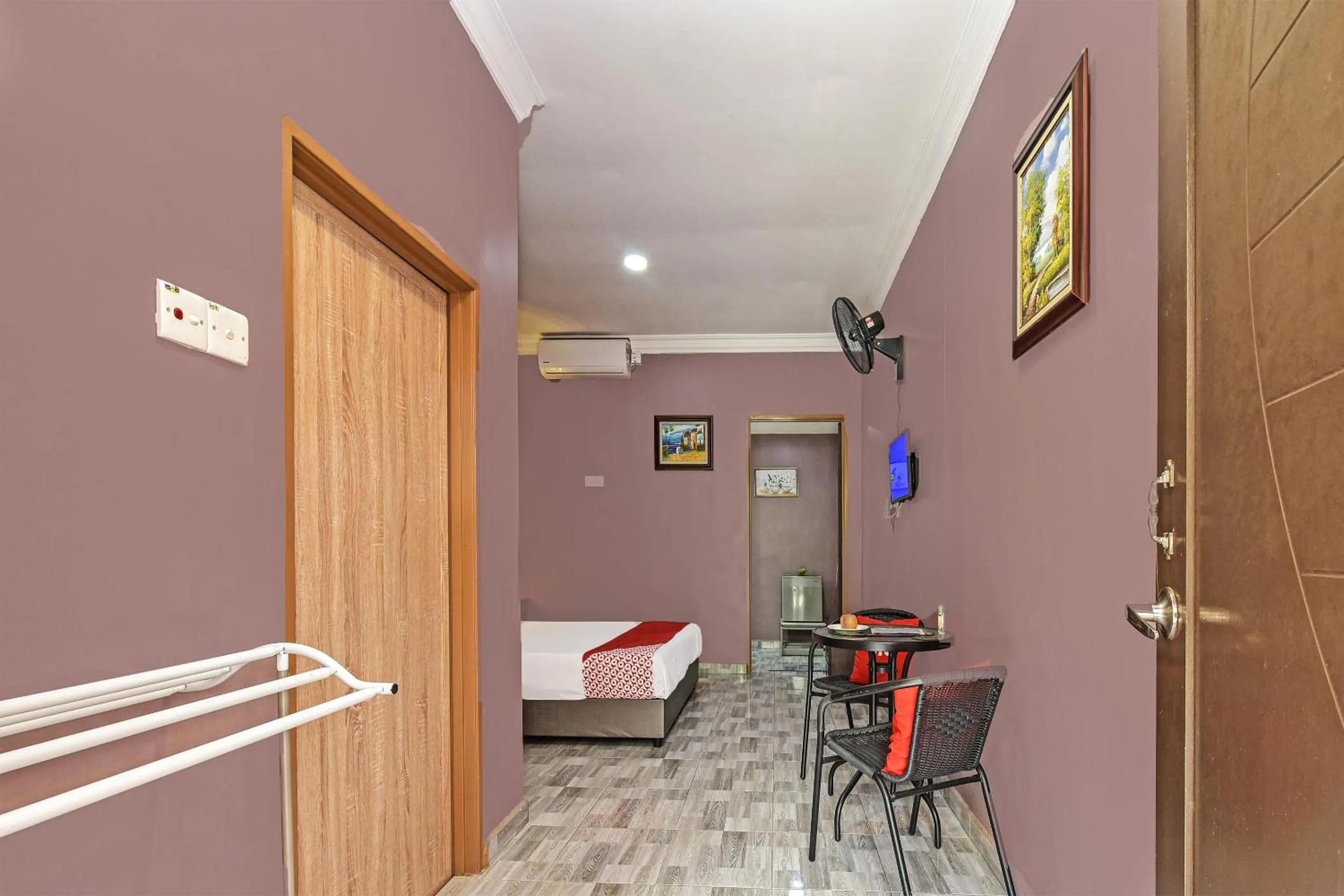 Bedroom in OYO Home 90348 Inspire Rooms