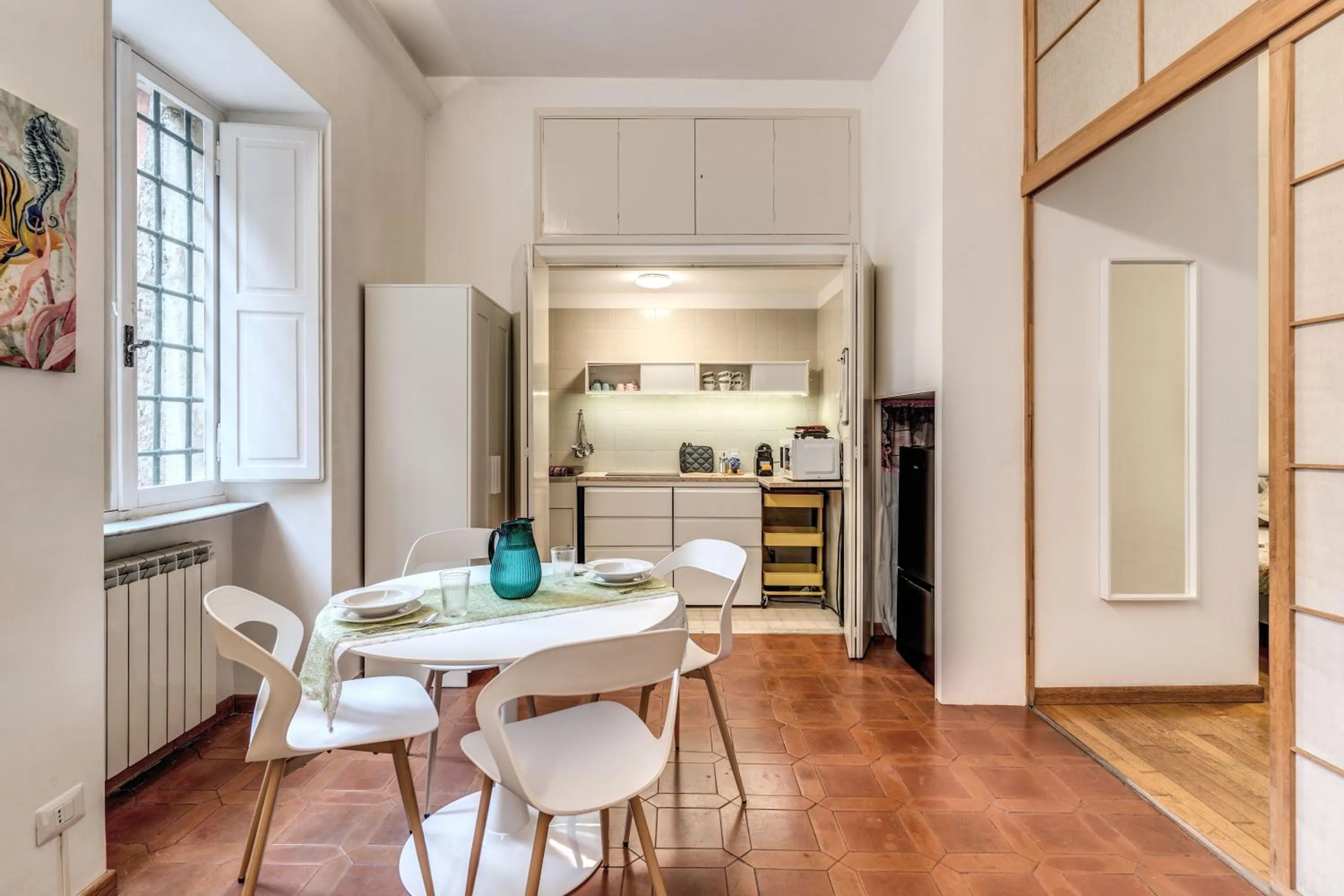 Dining area in Elegant Apartment Behind the Colosseum
