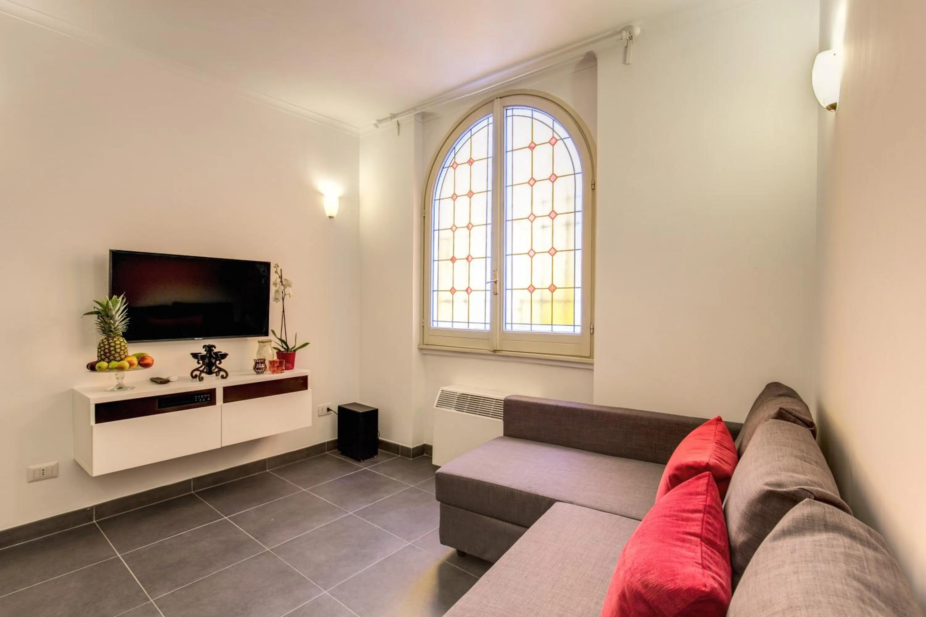 Living room in Elegant Apartment Behind the Colosseum