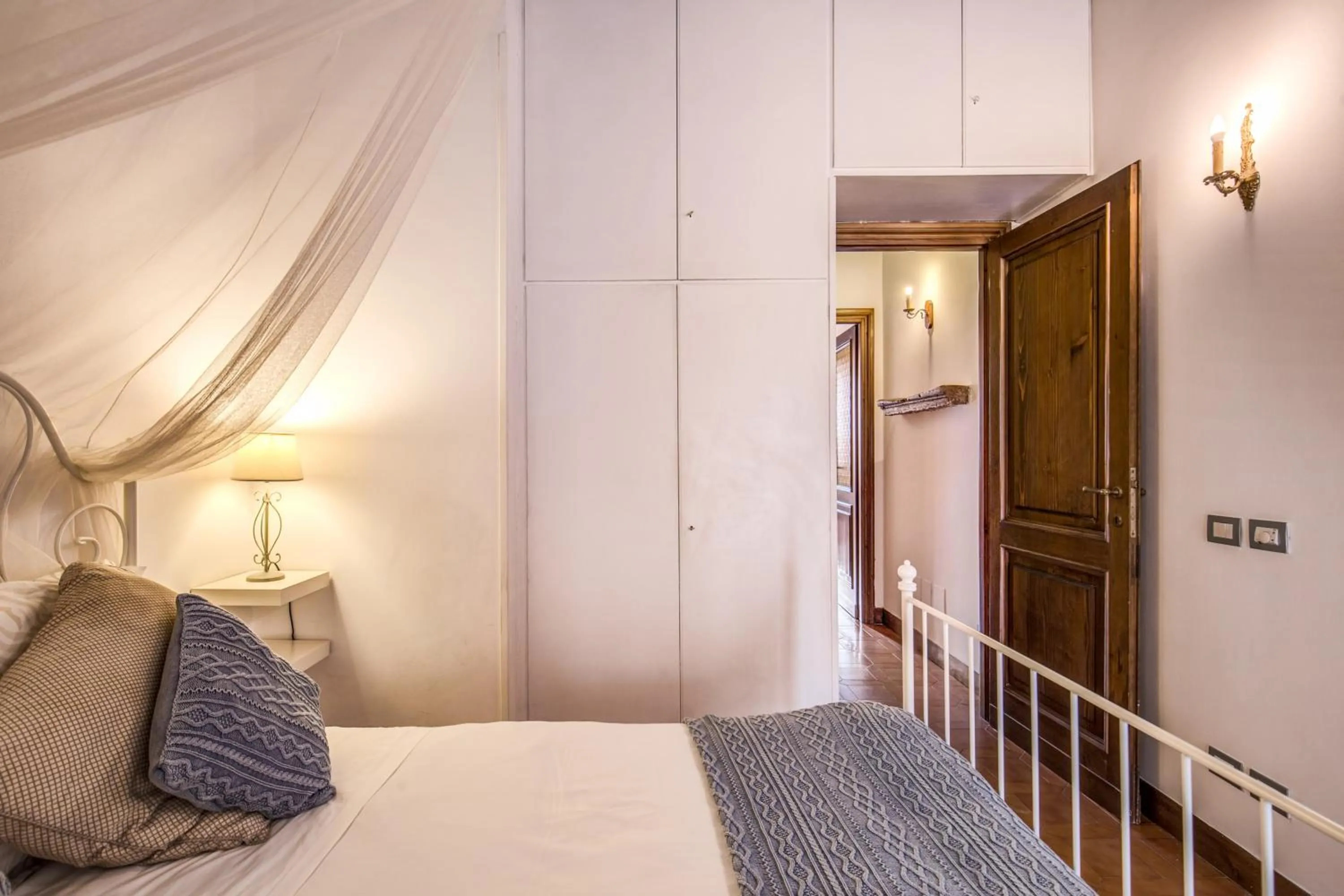 Bedroom, Bed in Elegant Apartment Behind the Colosseum