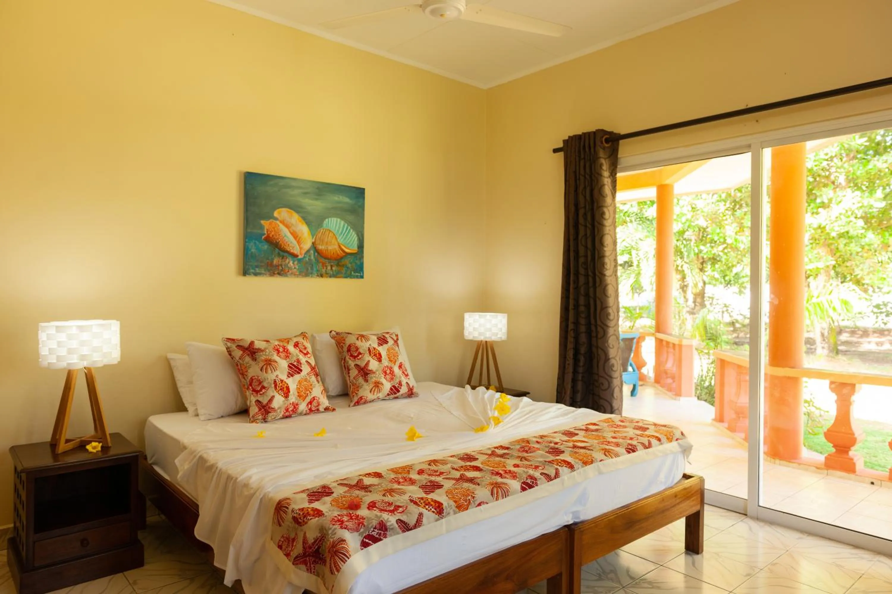 Bed in Villas des Alizes beachfront suites and garden villas