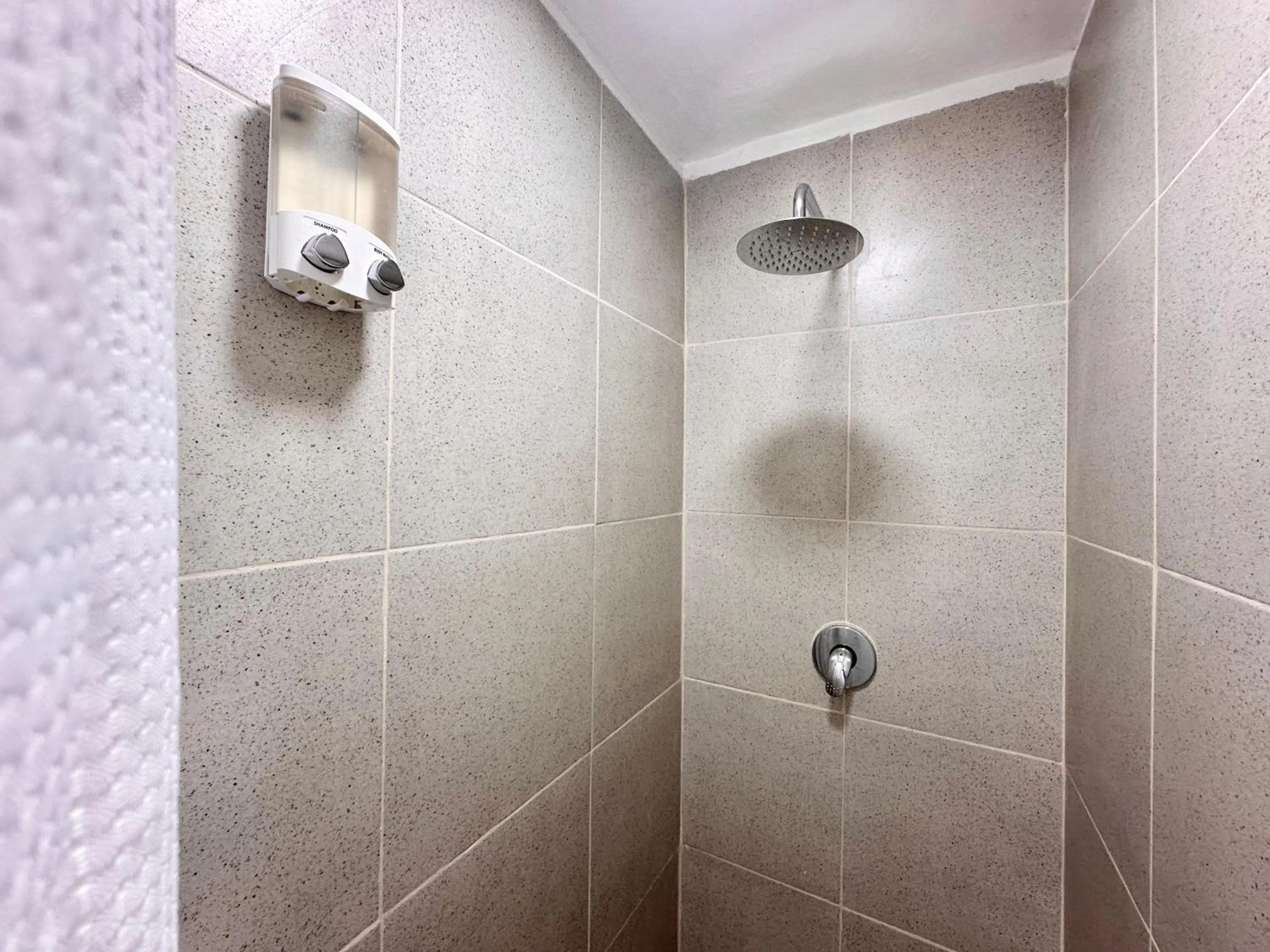 Shower in Coco Suites by Andiani Travel