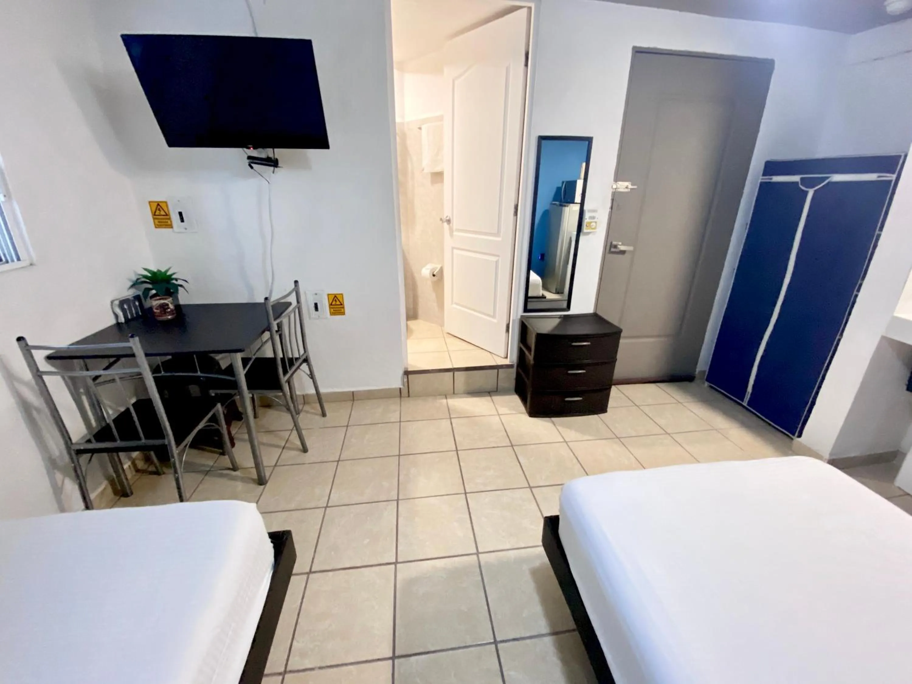 Photo of the whole room, Bed in Coco Suites by Andiani Travel