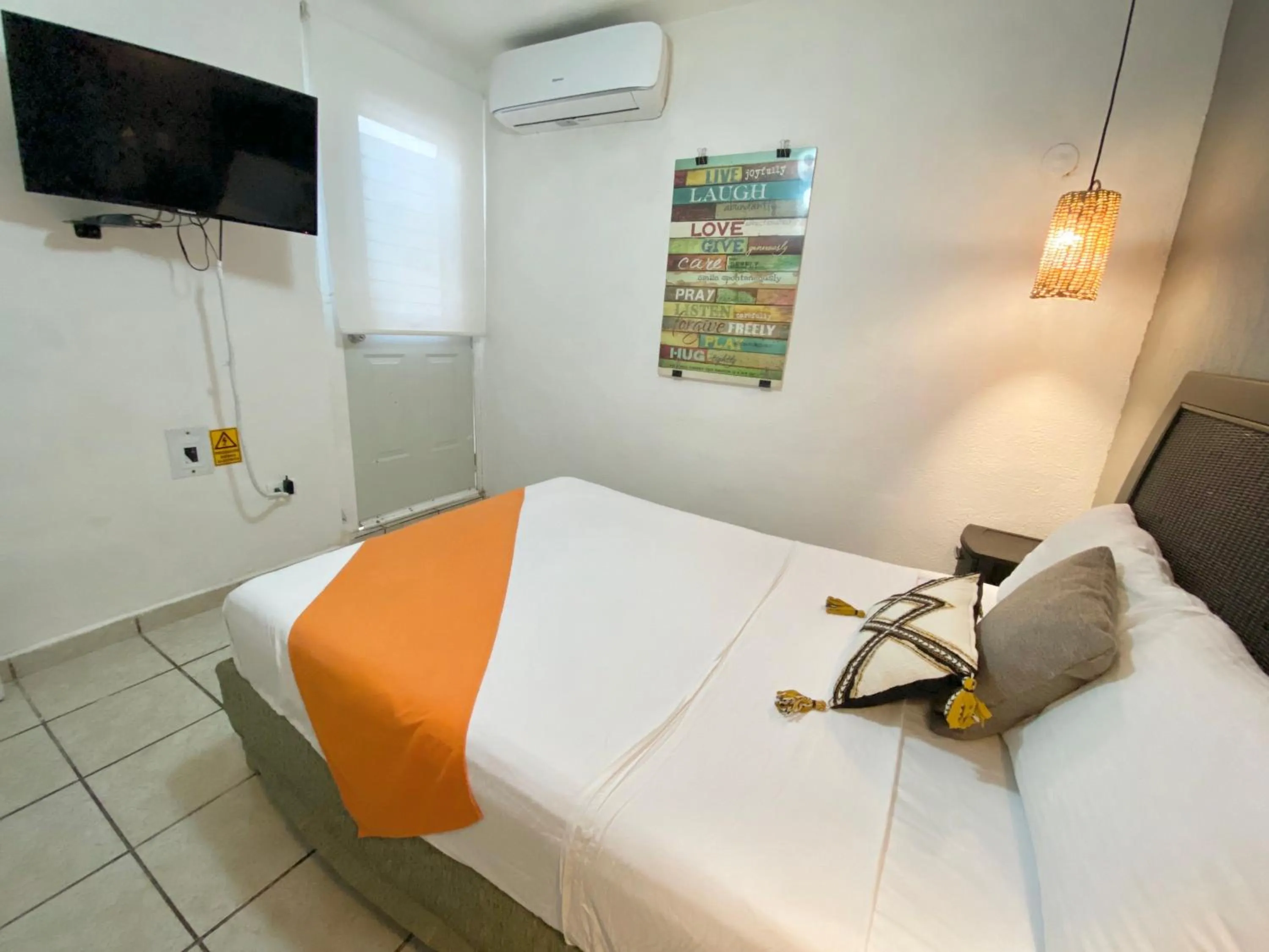 TV and multimedia, Bed in Coco Suites by Andiani Travel