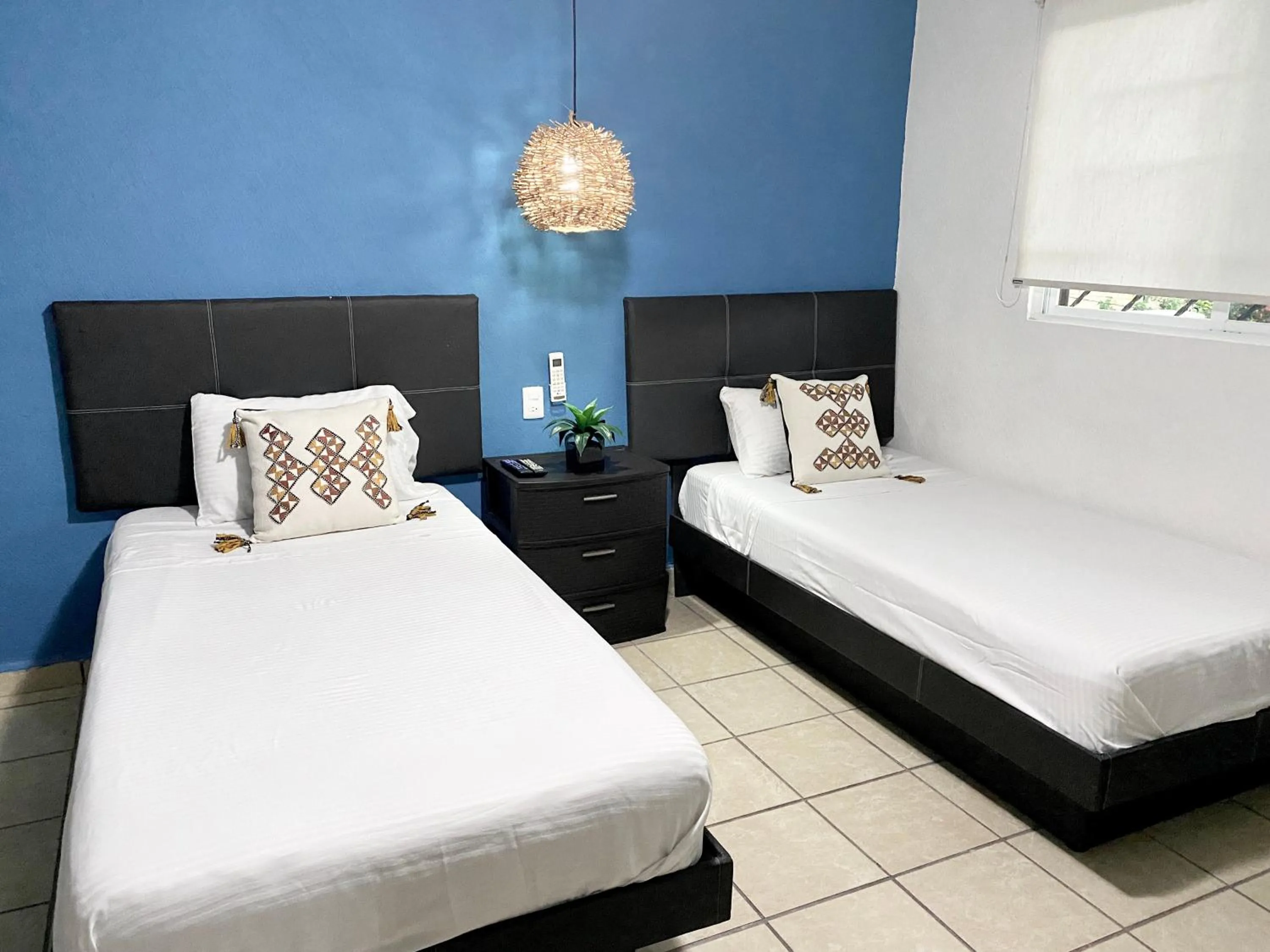 Bedroom, Bed in Coco Suites by Andiani Travel