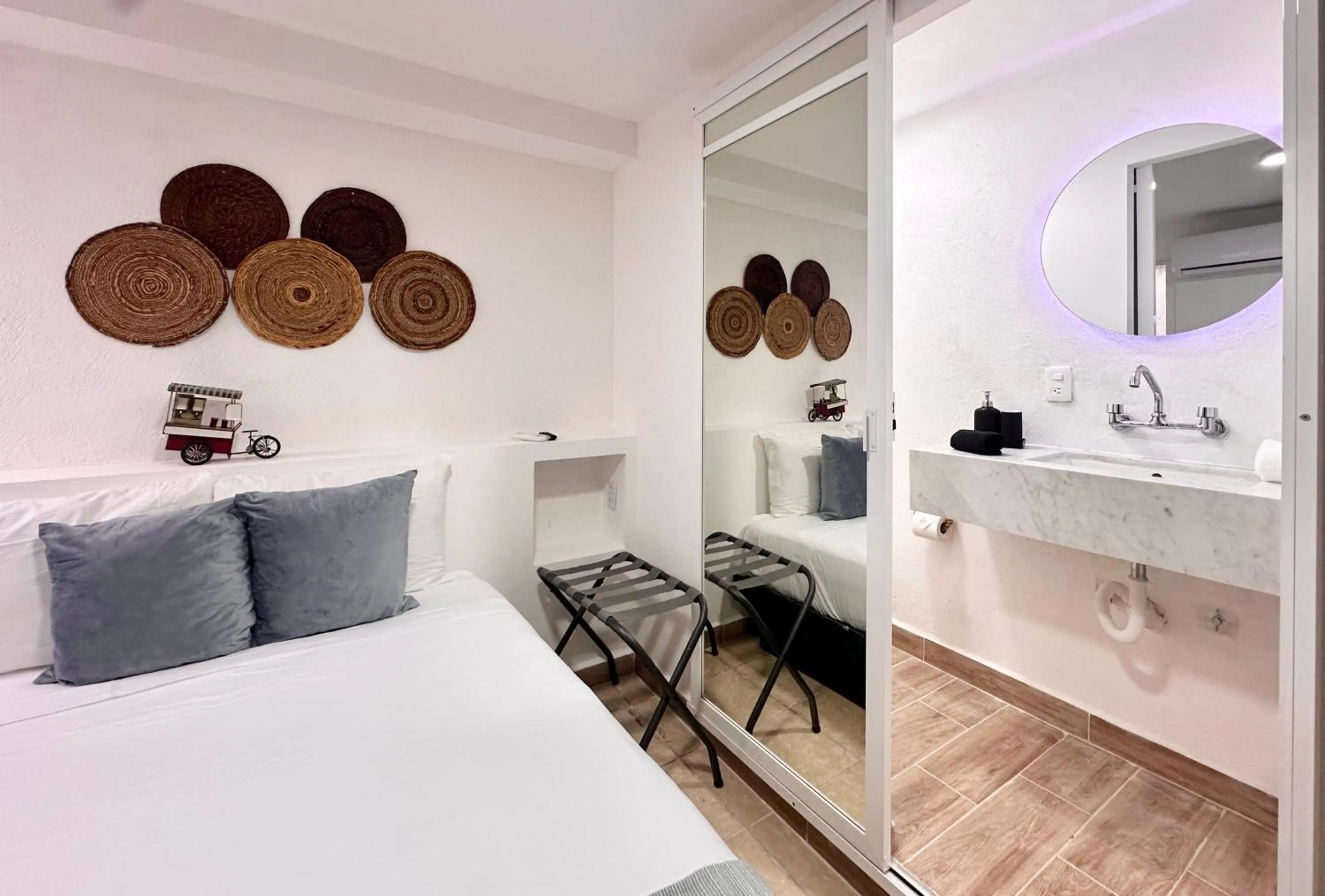 Photo of the whole room, Bed in Coco Suites by Andiani Travel