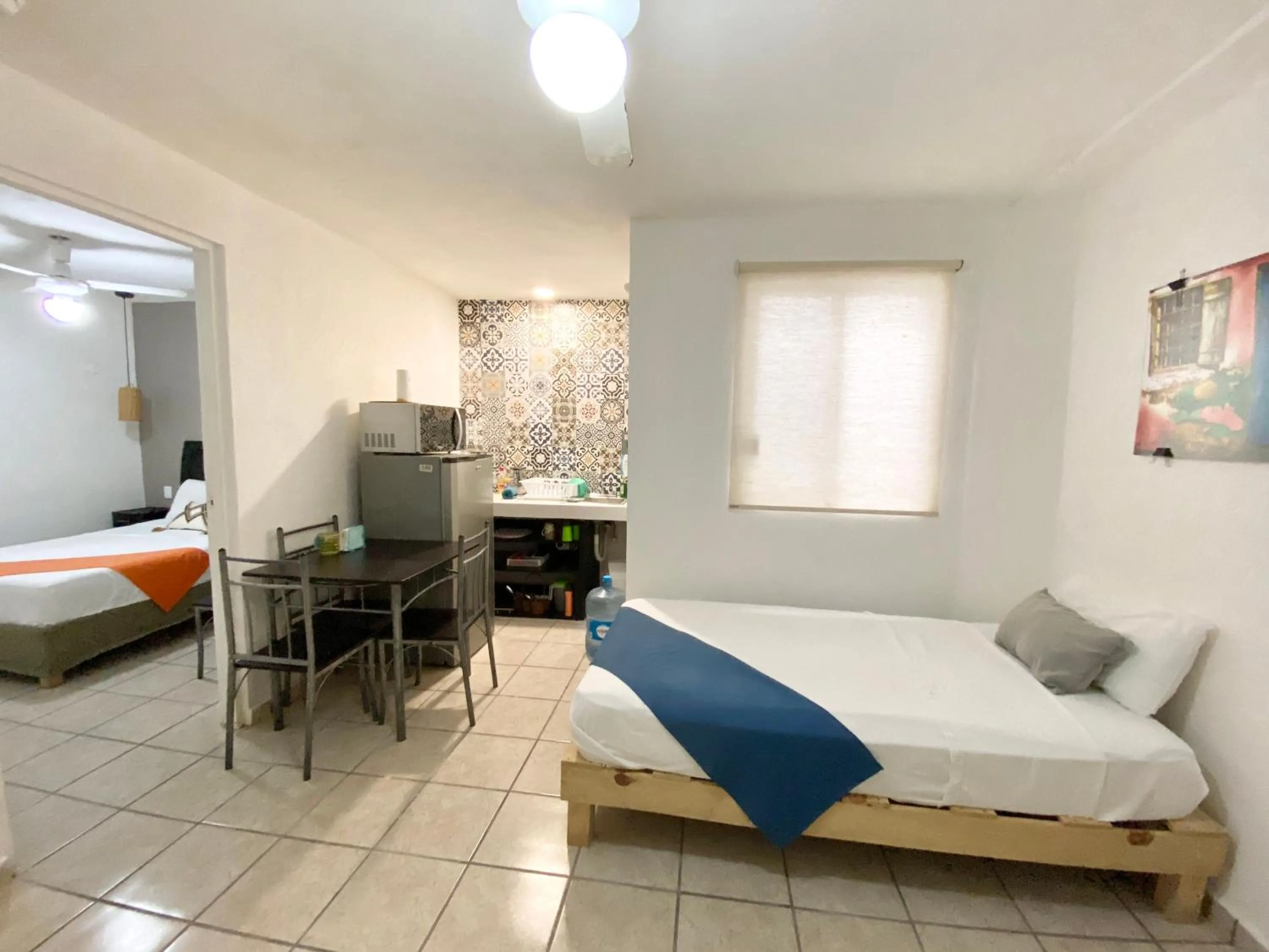 Kitchen or kitchenette, Bed in Coco Suites by Andiani Travel