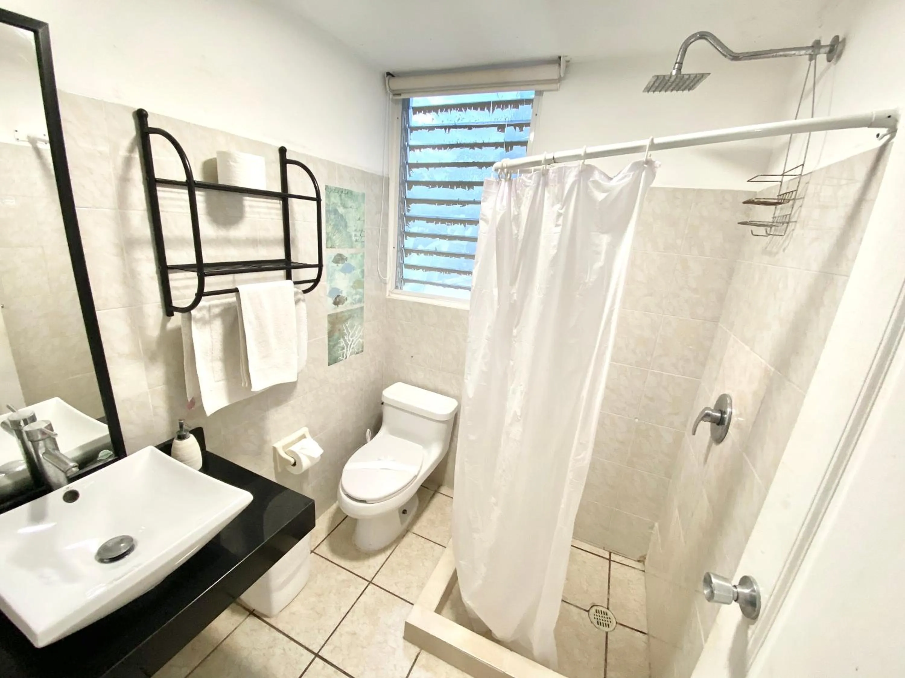 Shower in Coco Suites by Andiani Travel