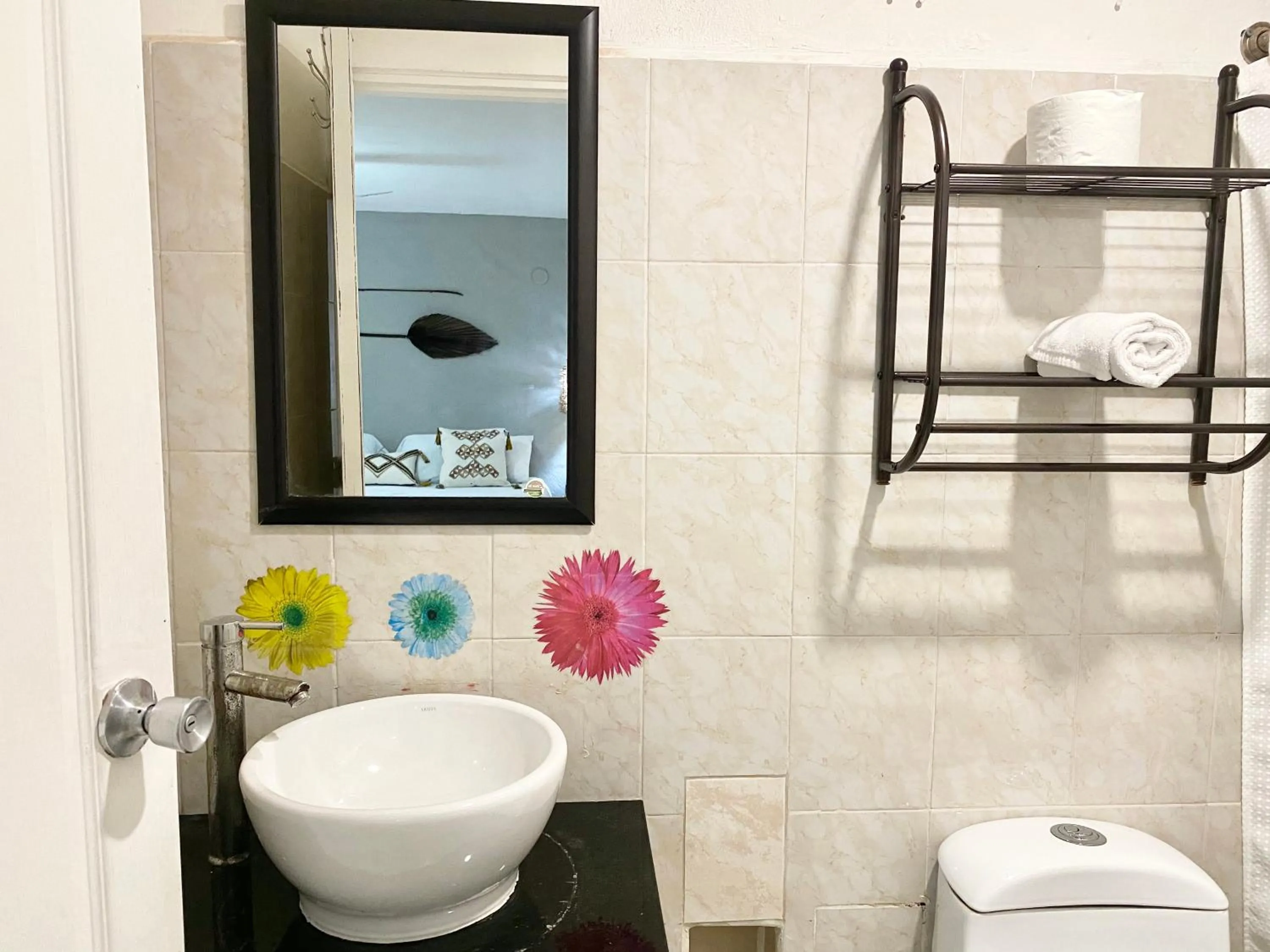 Bathroom in Coco Suites by Andiani Travel