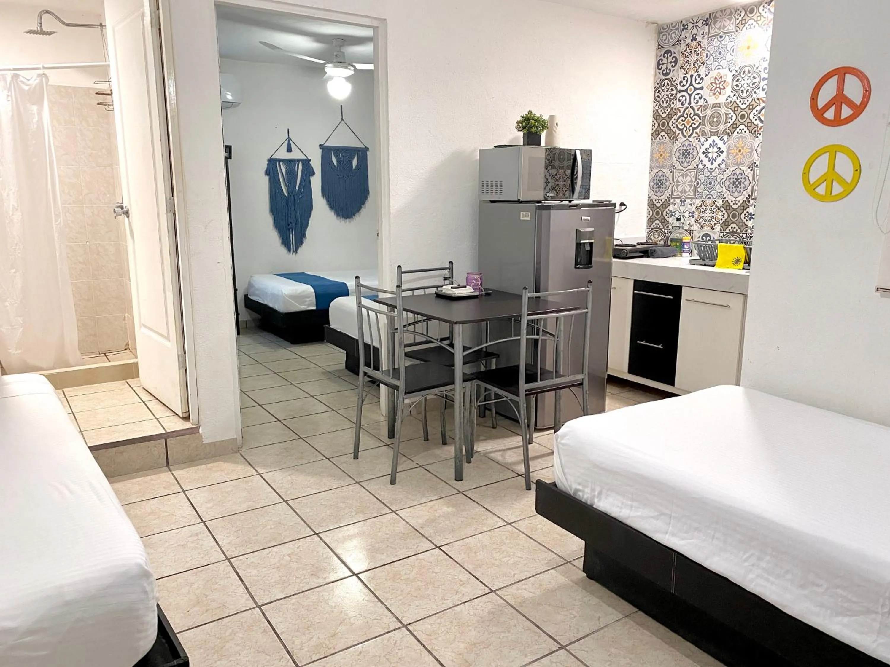 Kitchen or kitchenette, Bed in Coco Suites by Andiani Travel