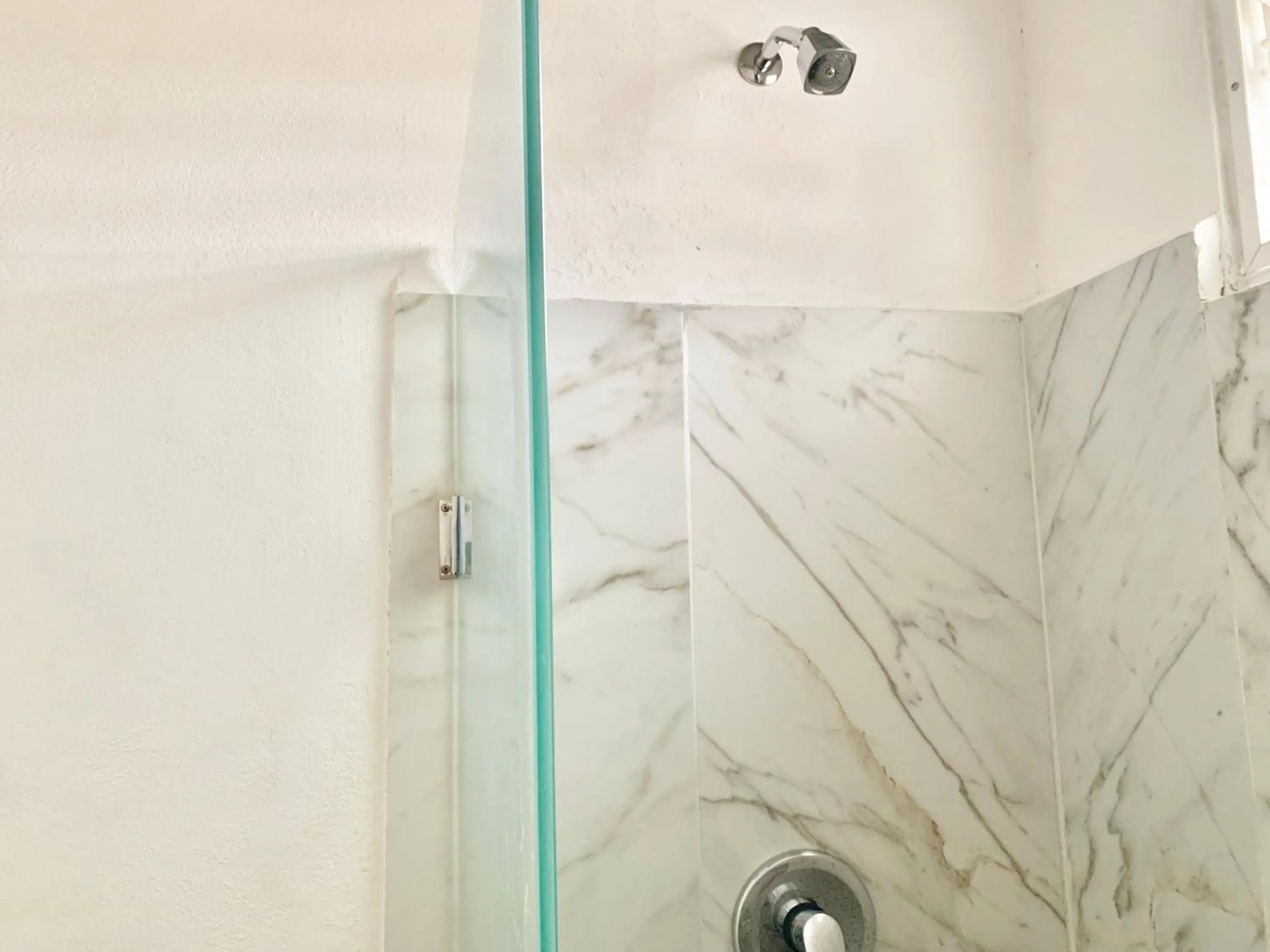 Shower in Coco Suites by Andiani Travel