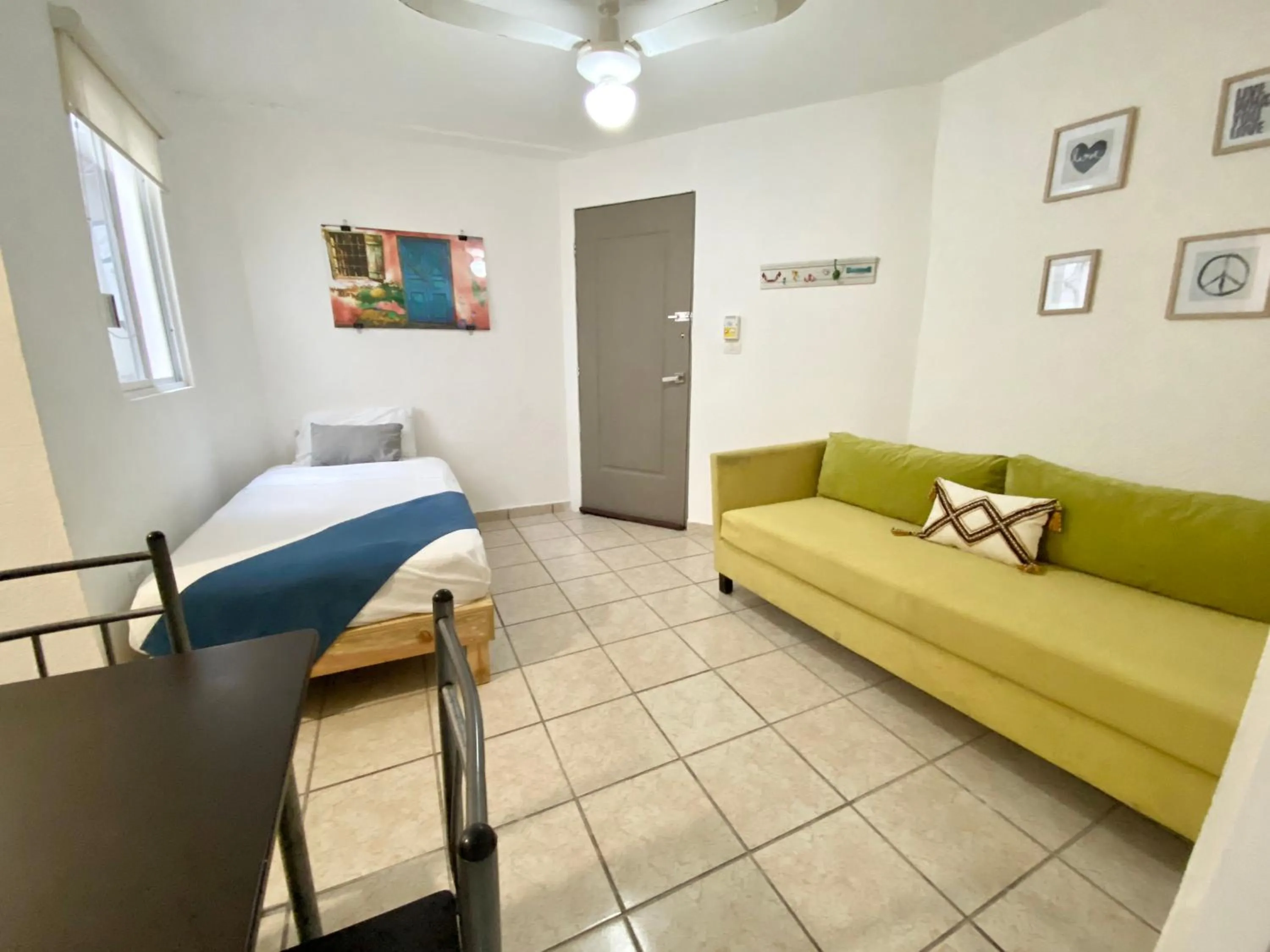 Living room, Bed in Coco Suites by Andiani Travel