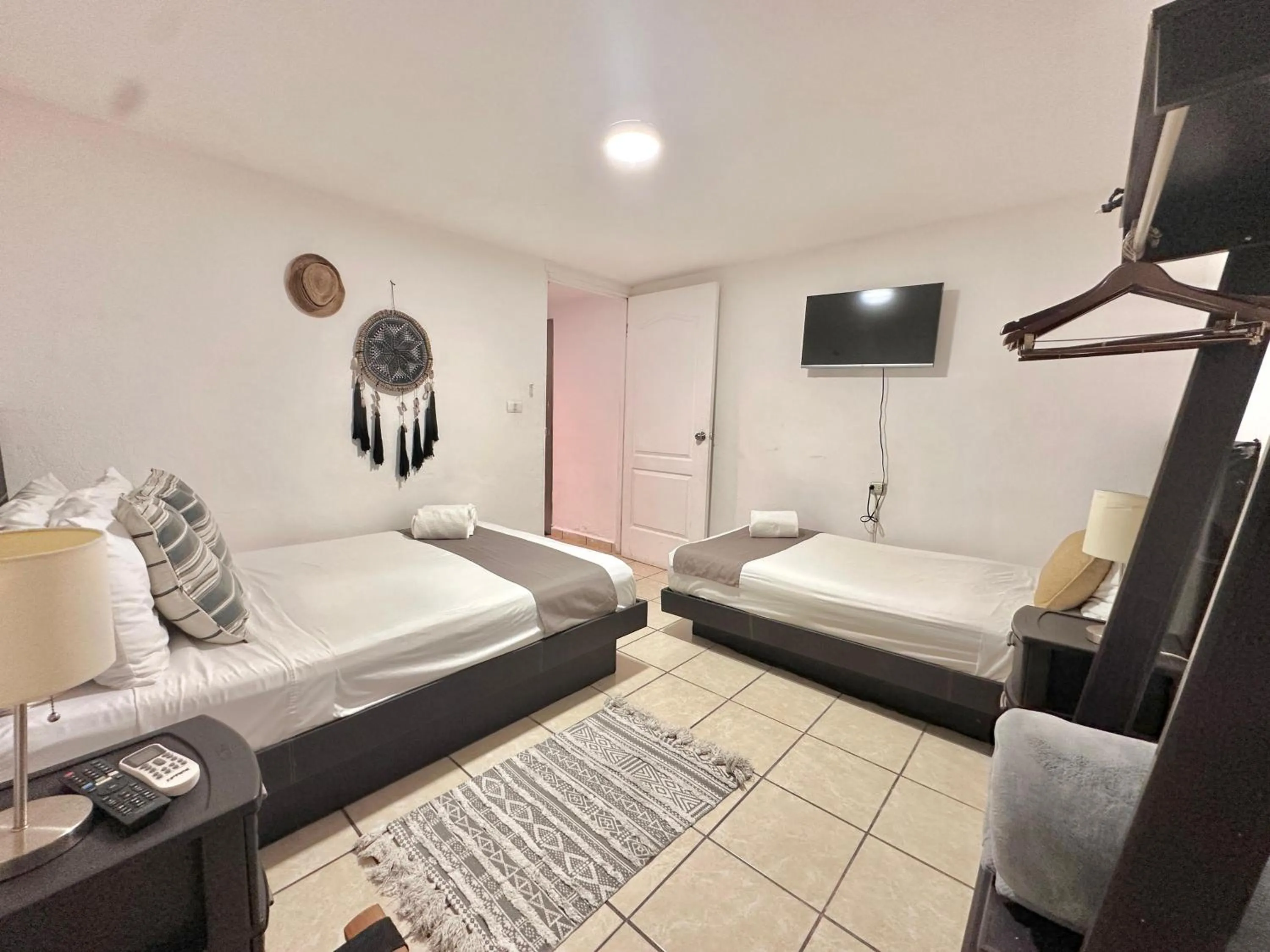 TV and multimedia, Bed in Coco Suites by Andiani Travel