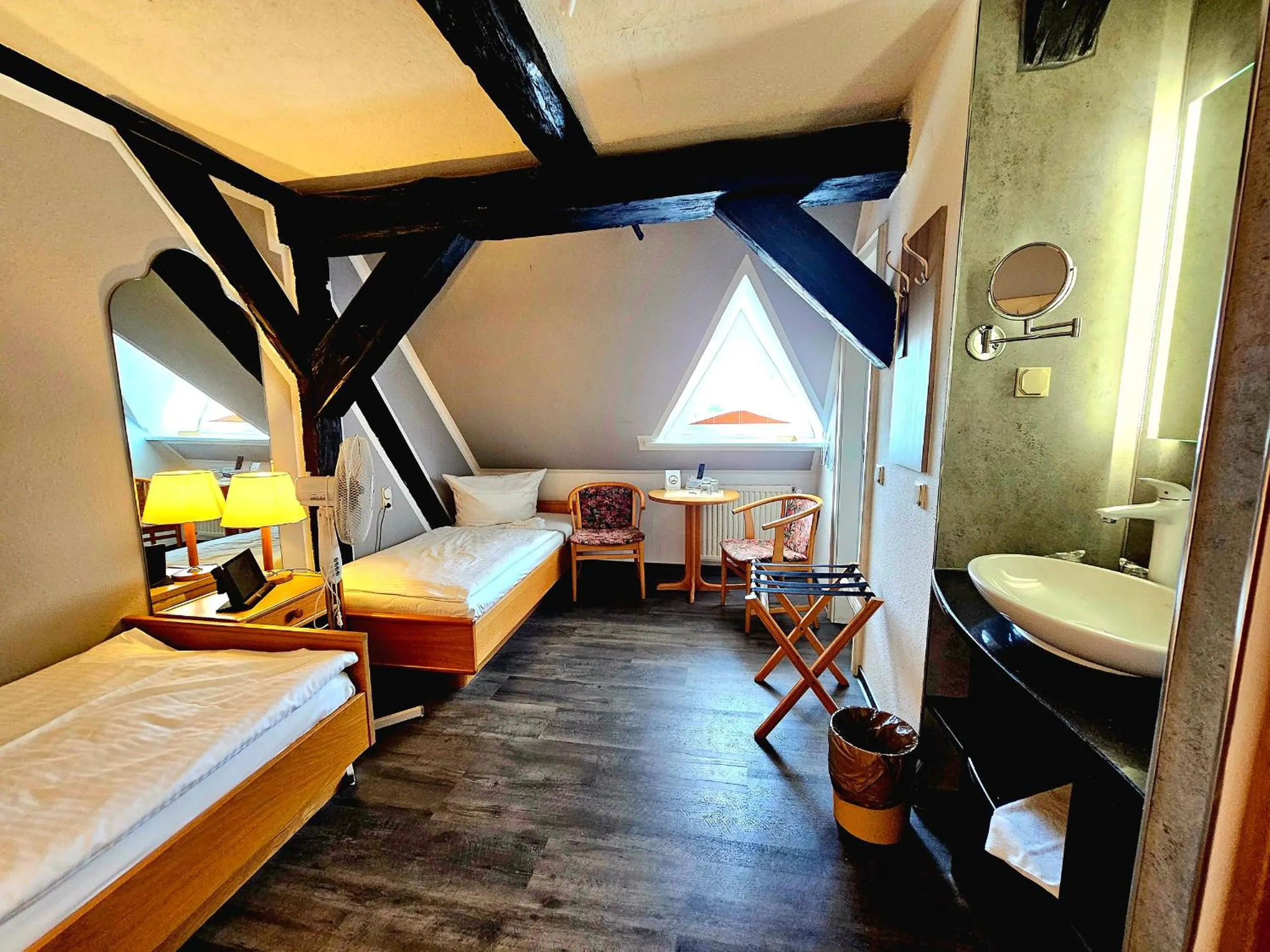 Photo of the whole room, Bed in Hotel Am Markt & Brauhaus Stadtkrug