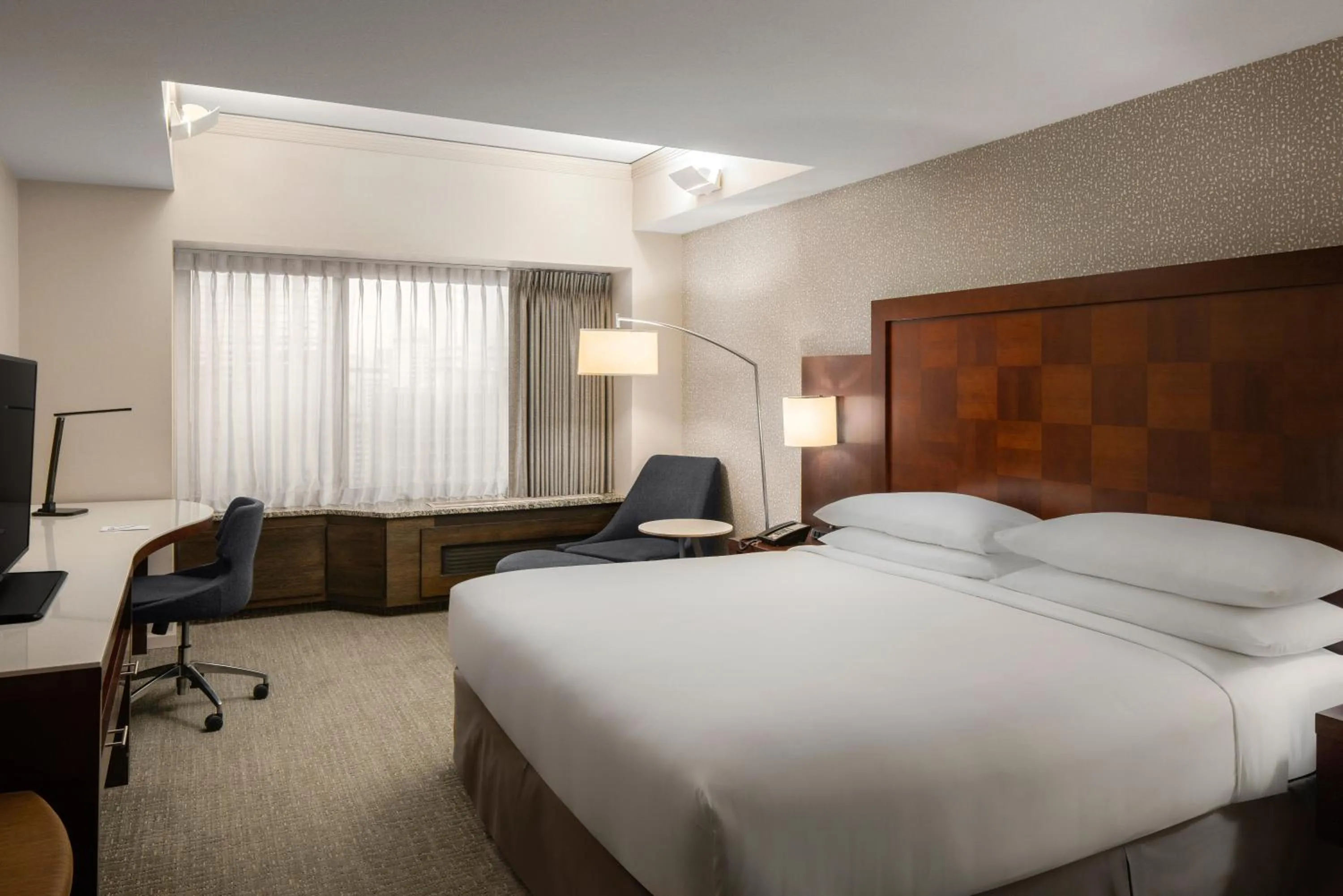 Bed in Renaissance Seattle Hotel