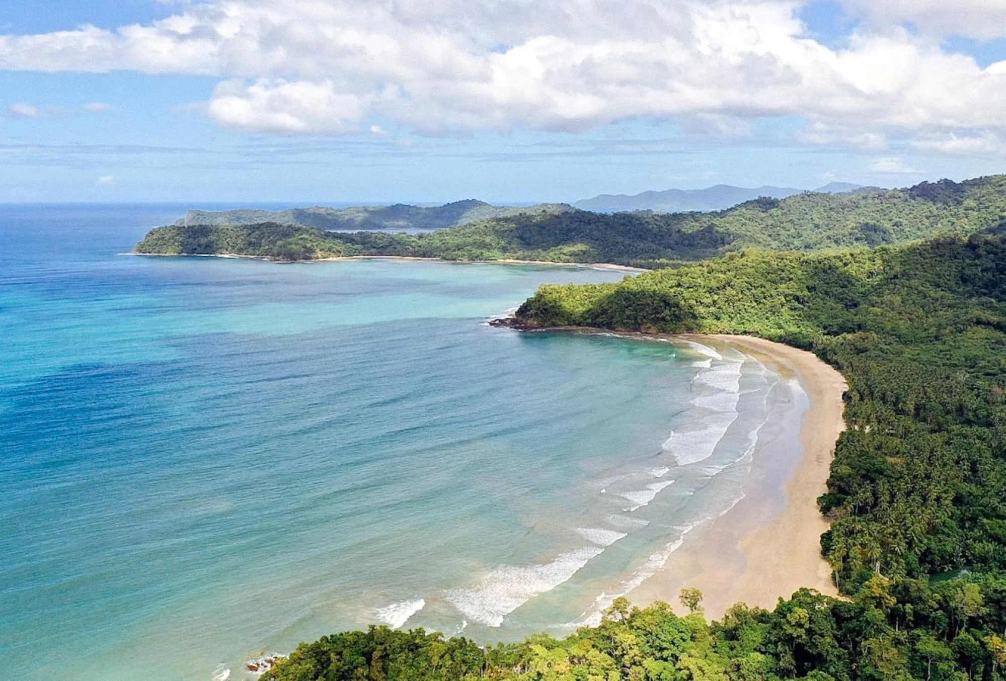 Beach in Arkadia Beach Resort by RedDoorz