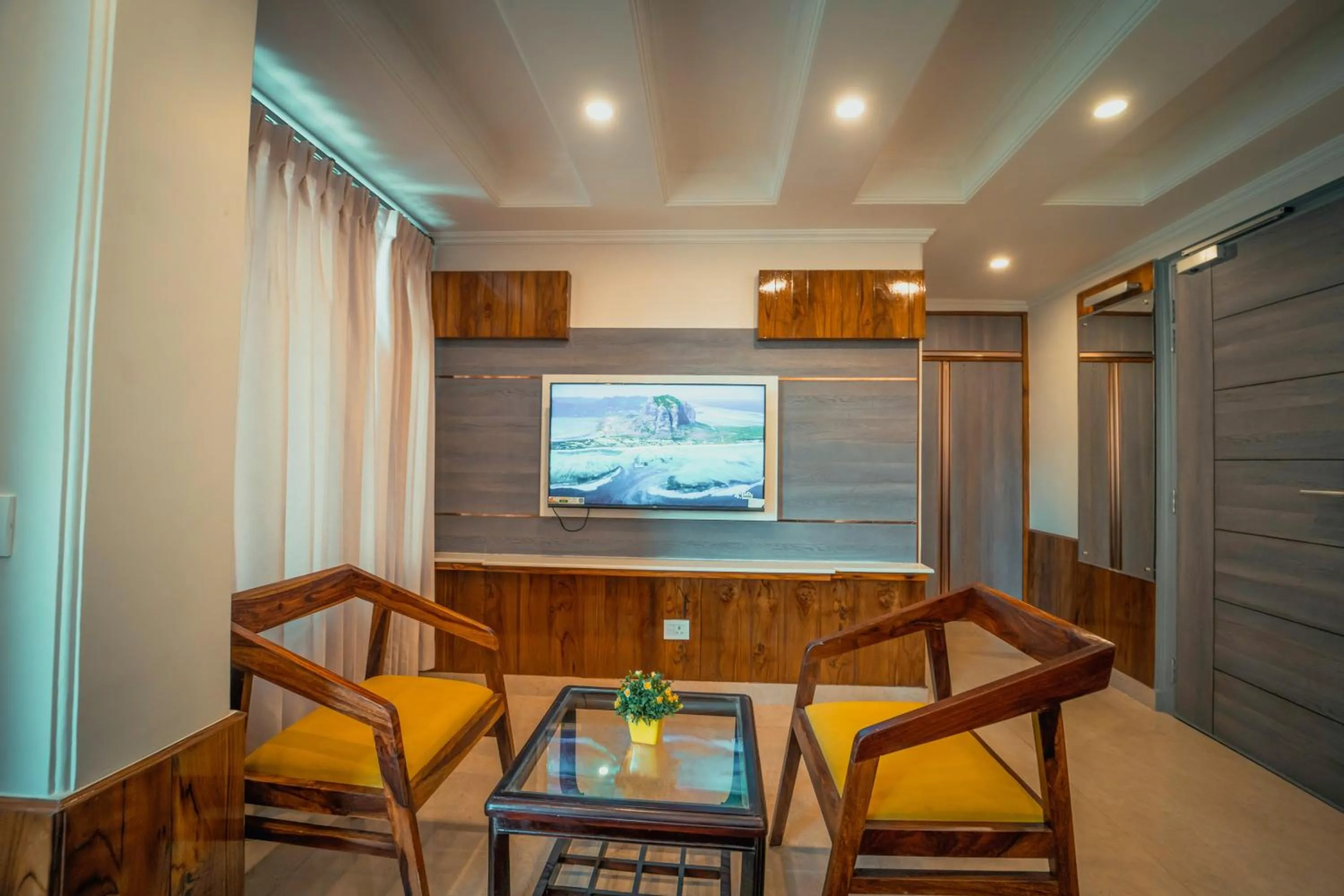 TV and multimedia in Singhs BnB by Lazy Getaways