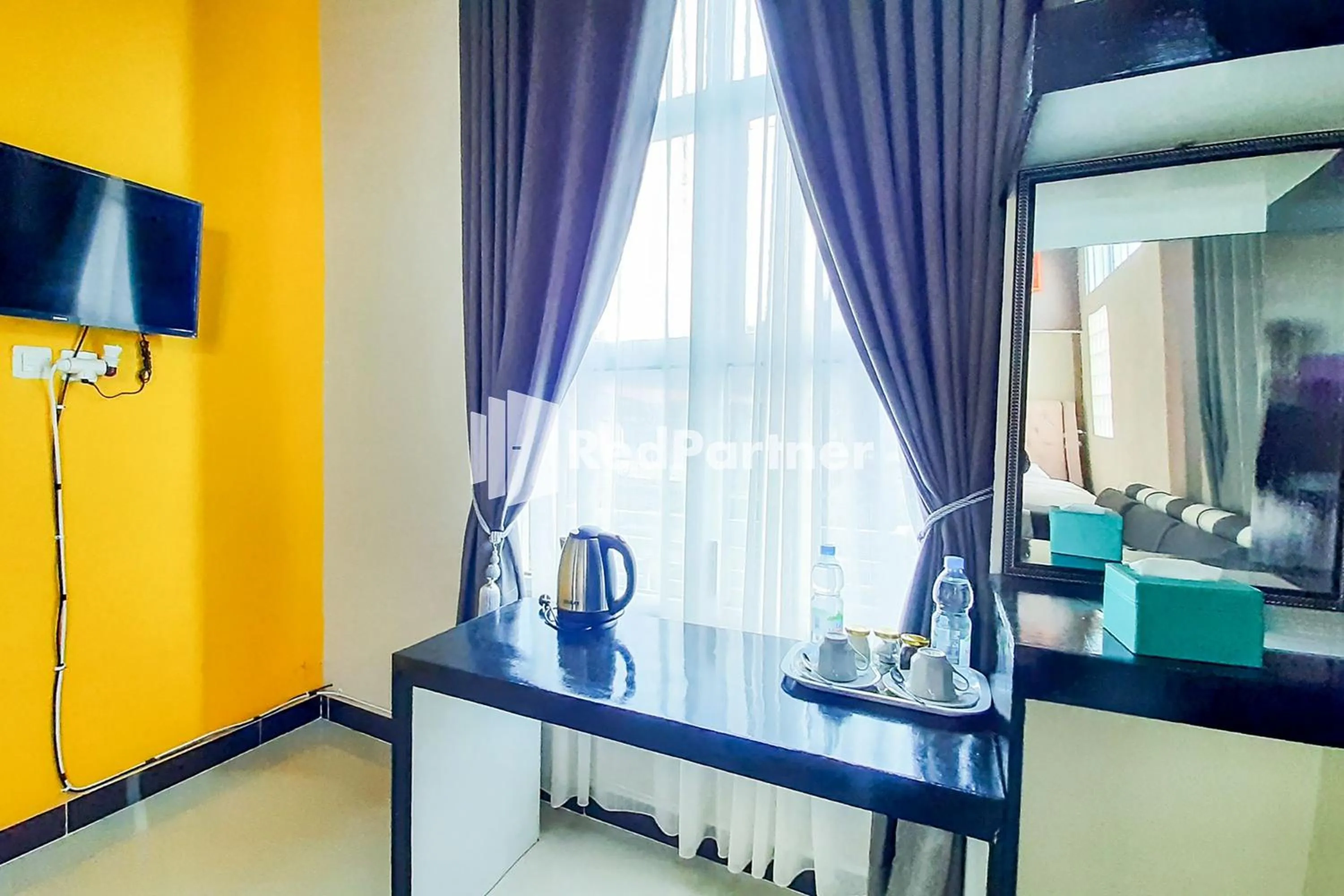 Coffee/tea facilities, Bed in MT Syariah Homestay Kerinci RedPartner