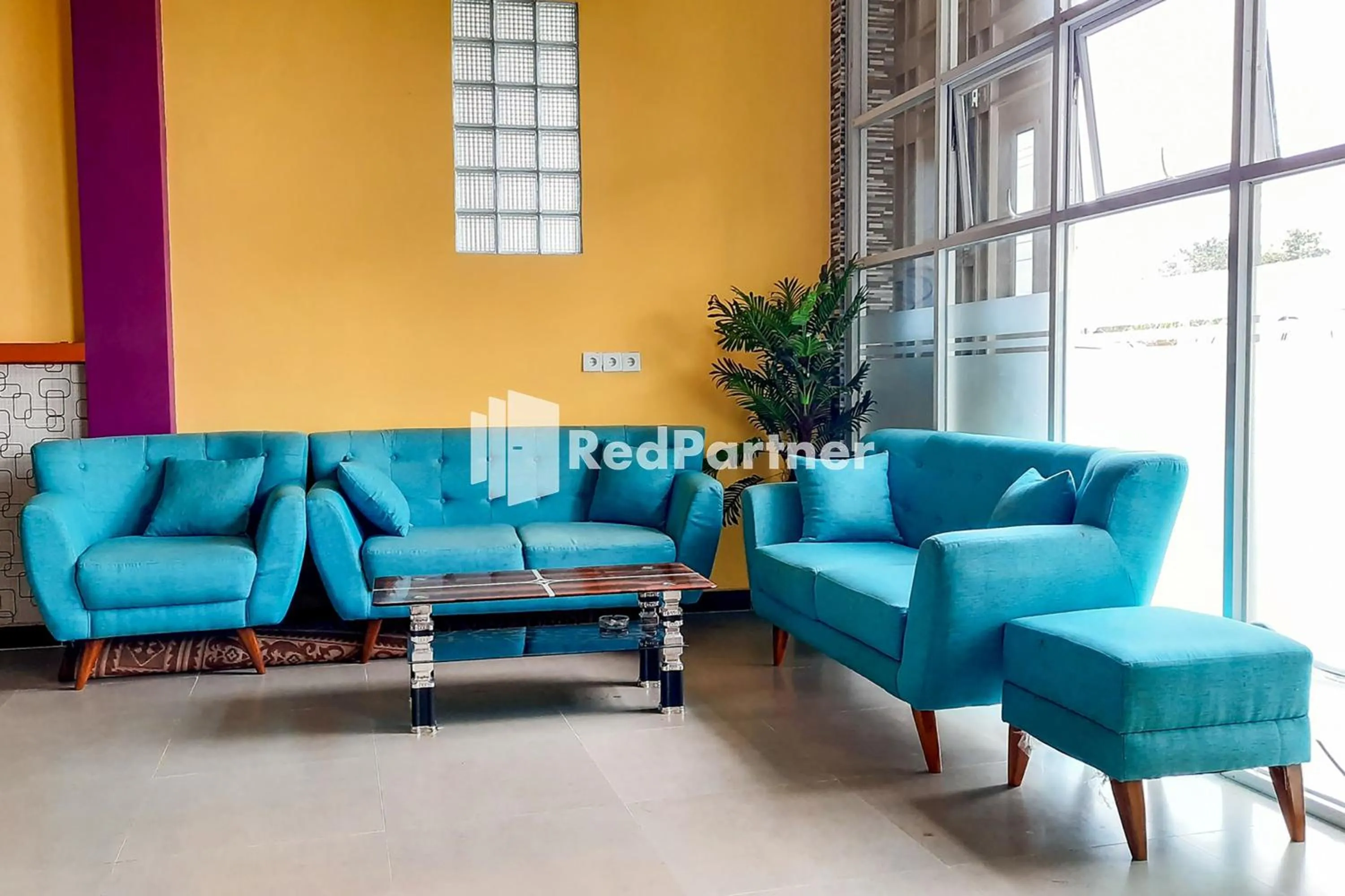 Seating area in MT Syariah Homestay Kerinci RedPartner