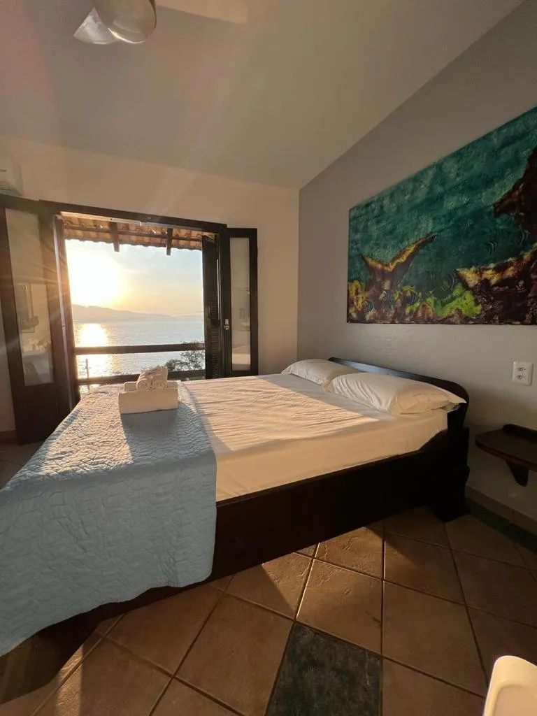 Bed in Pousada Caminho do Mar