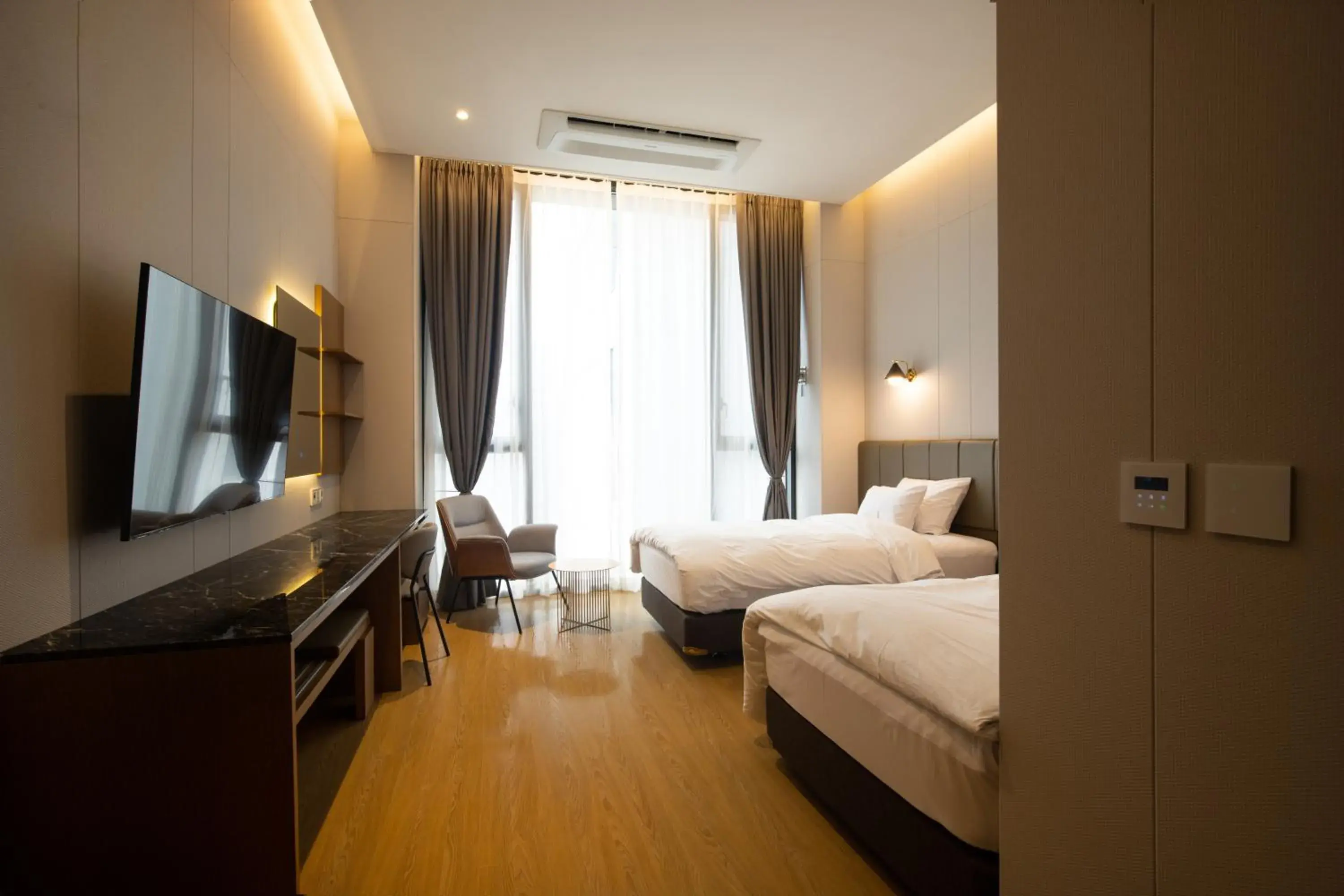 Photo of the whole room, Bed in Jeonju Tourist Hotel kkotsim Photo of the whole room, Bed in Jeonju Tourist Hotel kkotsim