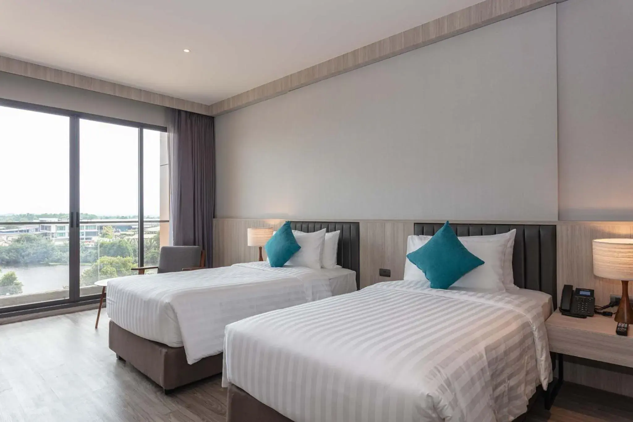 Bed in Laguna Grand Hotel & Spa Songkhla Bed in Laguna Grand Hotel & Spa Songkhla