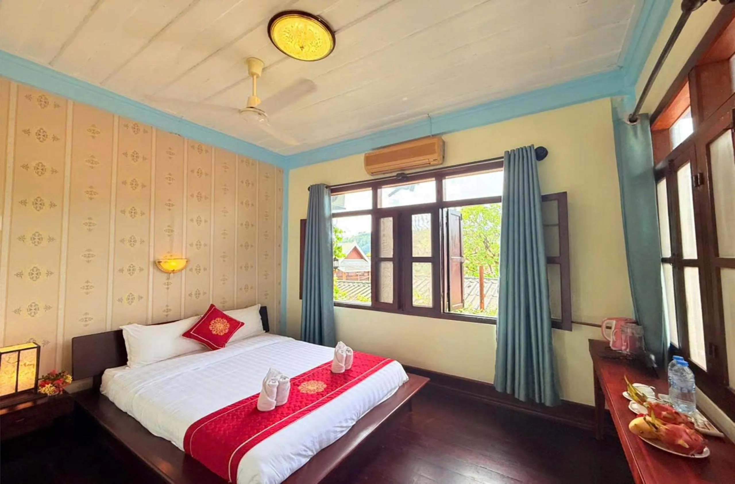 Bed in Luang Prabang Manichan Villa