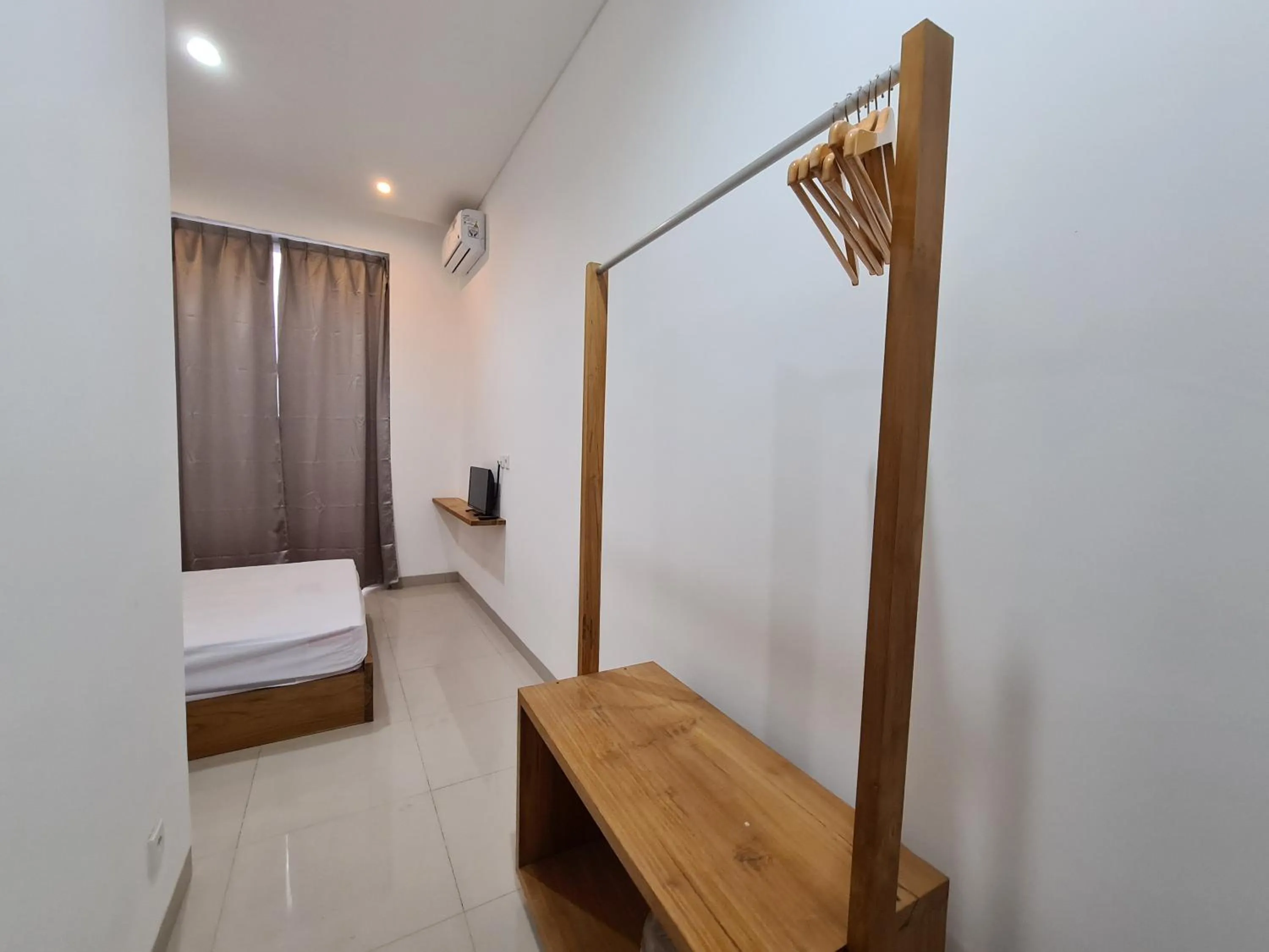 Bedroom, Bed in Graha Martadinata Syariah Mitra RedDoorz