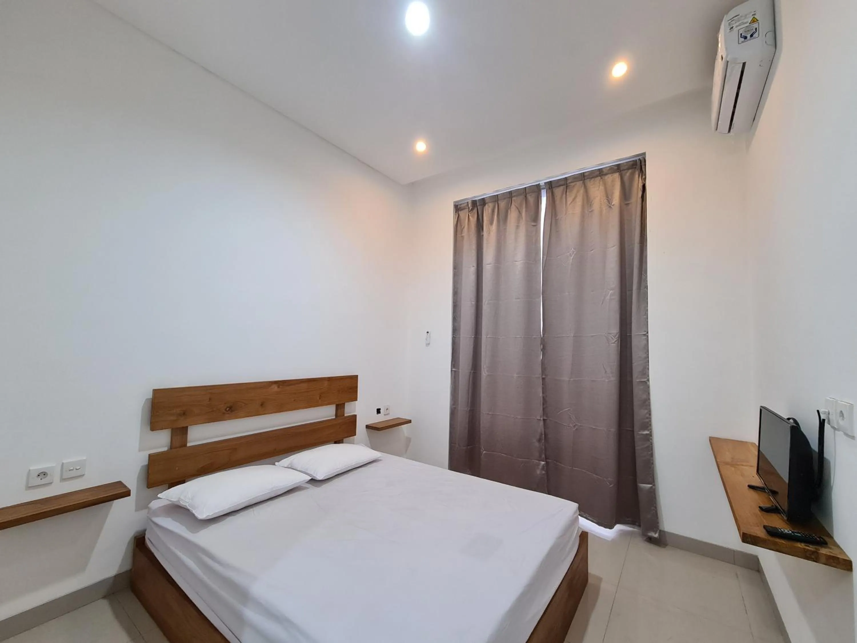 Bed in Graha Martadinata Syariah Mitra RedDoorz