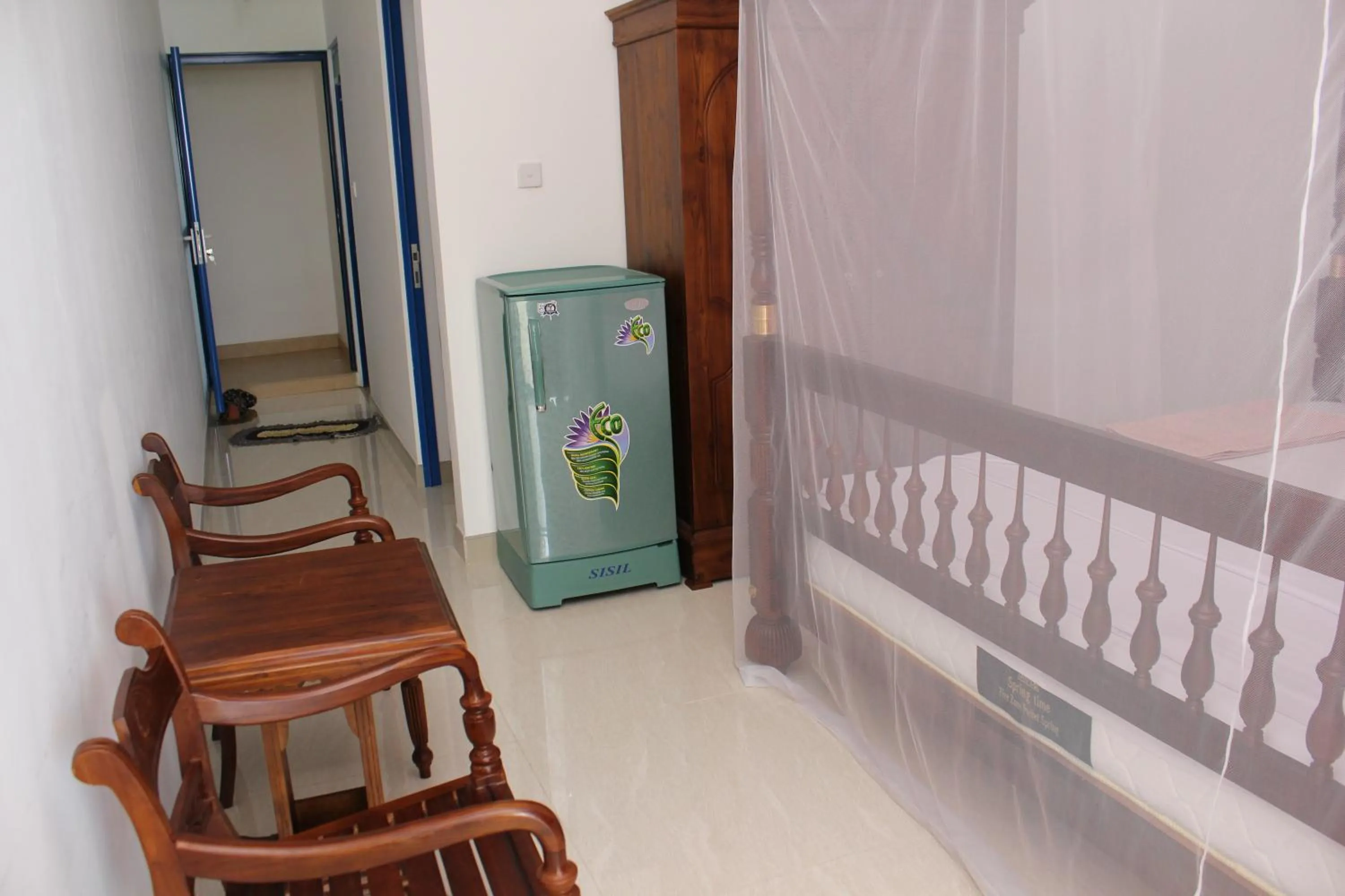 Bedroom in Paradise Beach Resort & Diving school