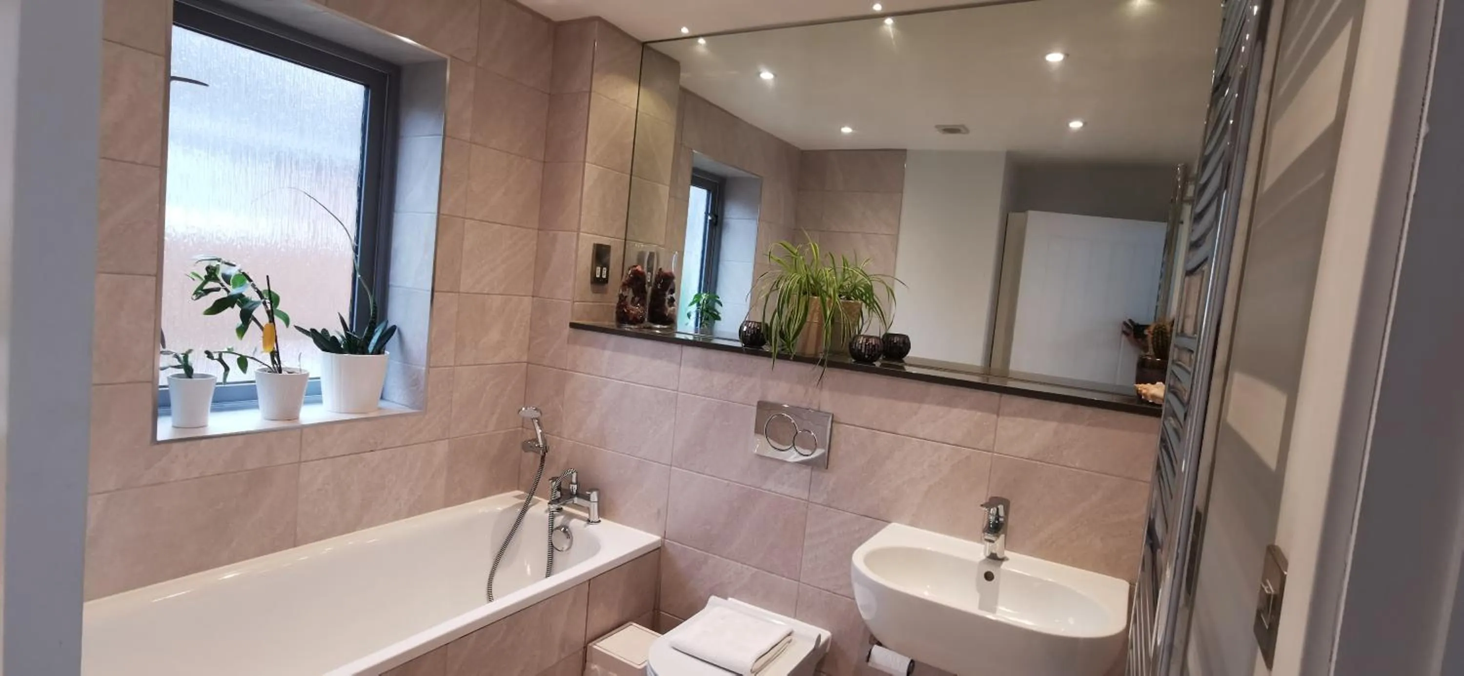 Bathroom in Modern City Centre House with Free Parking