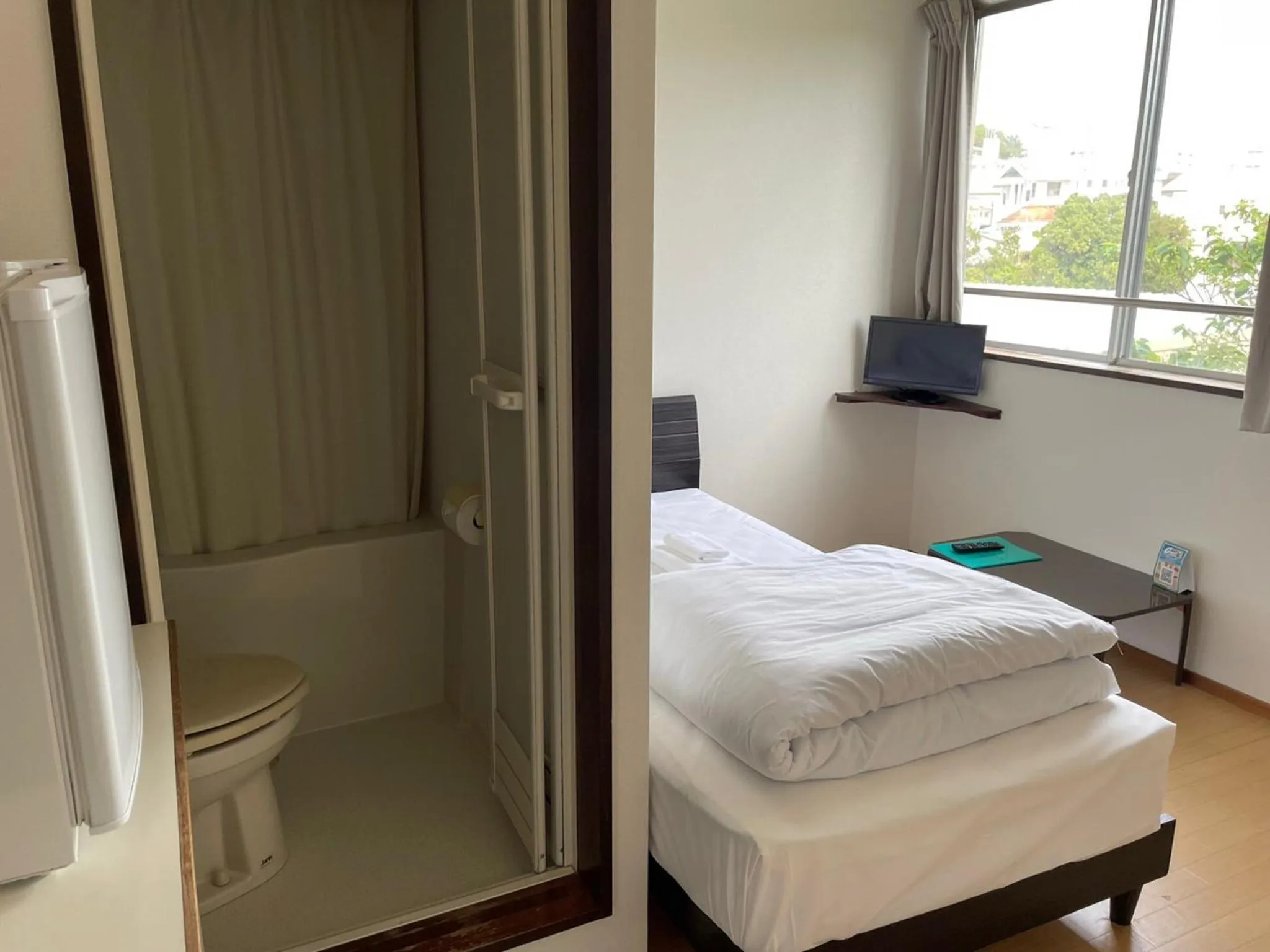 Photo of the whole room, Bed in Southern Village Okinawa