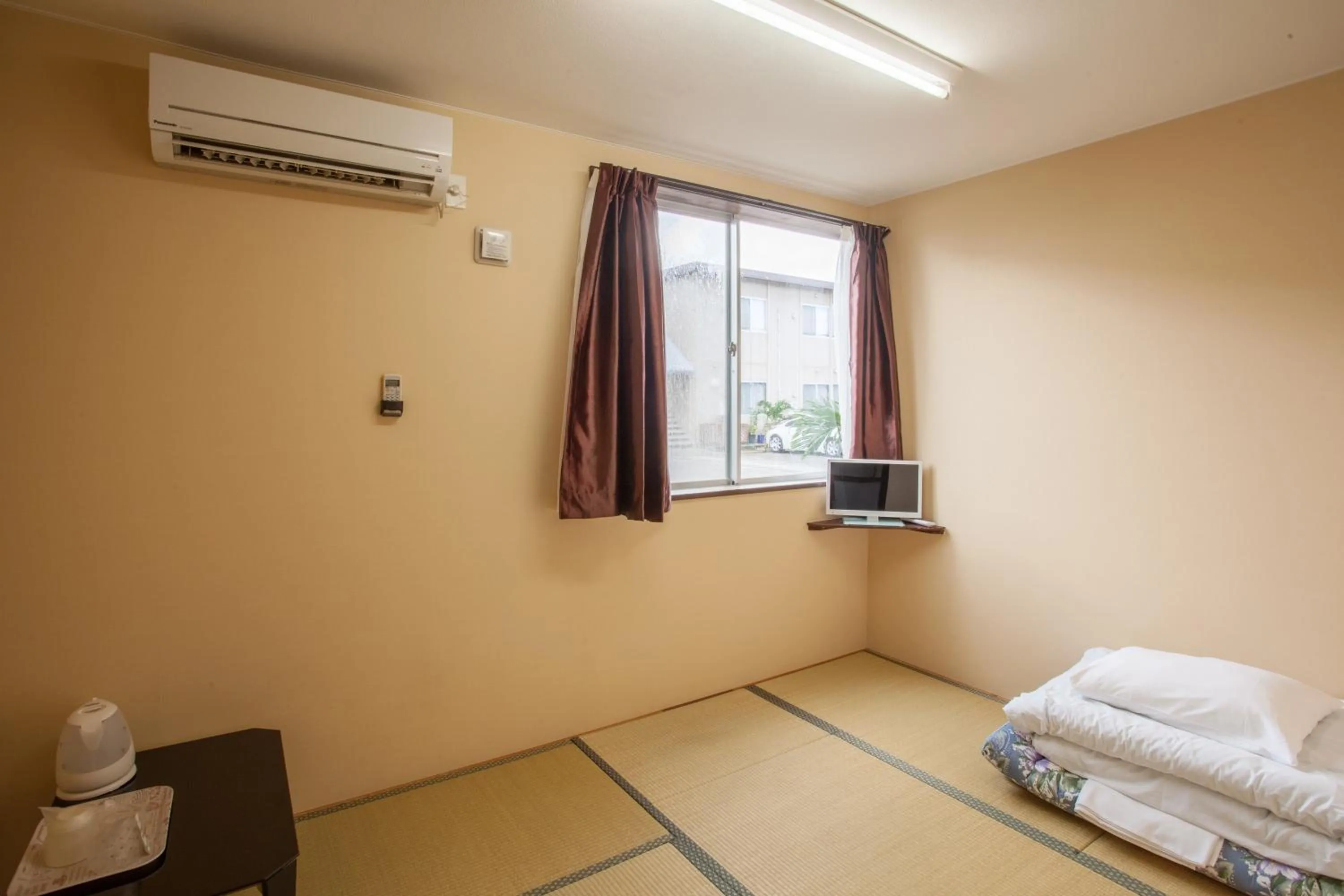 Photo of the whole room, Bed in Southern Village Okinawa