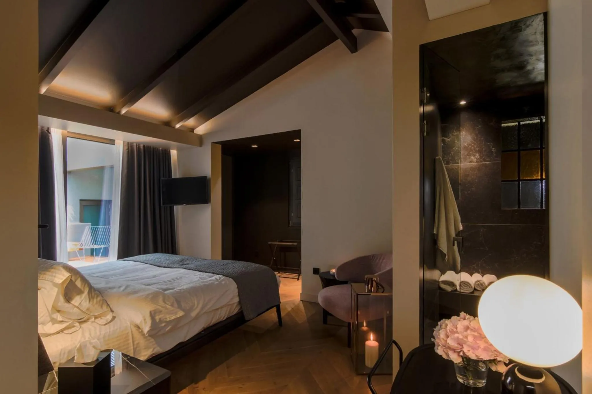 Bed in Nikiou Suites Luxury Residence