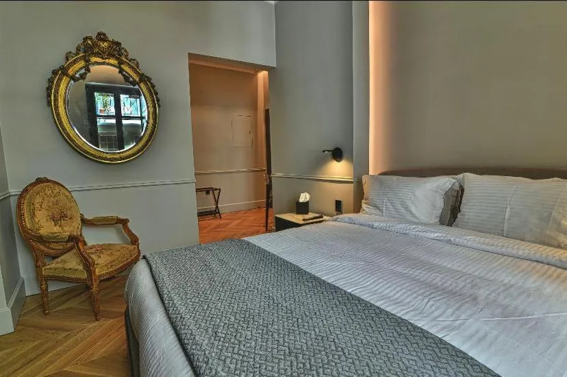 Bed in Nikiou Suites Luxury Residence