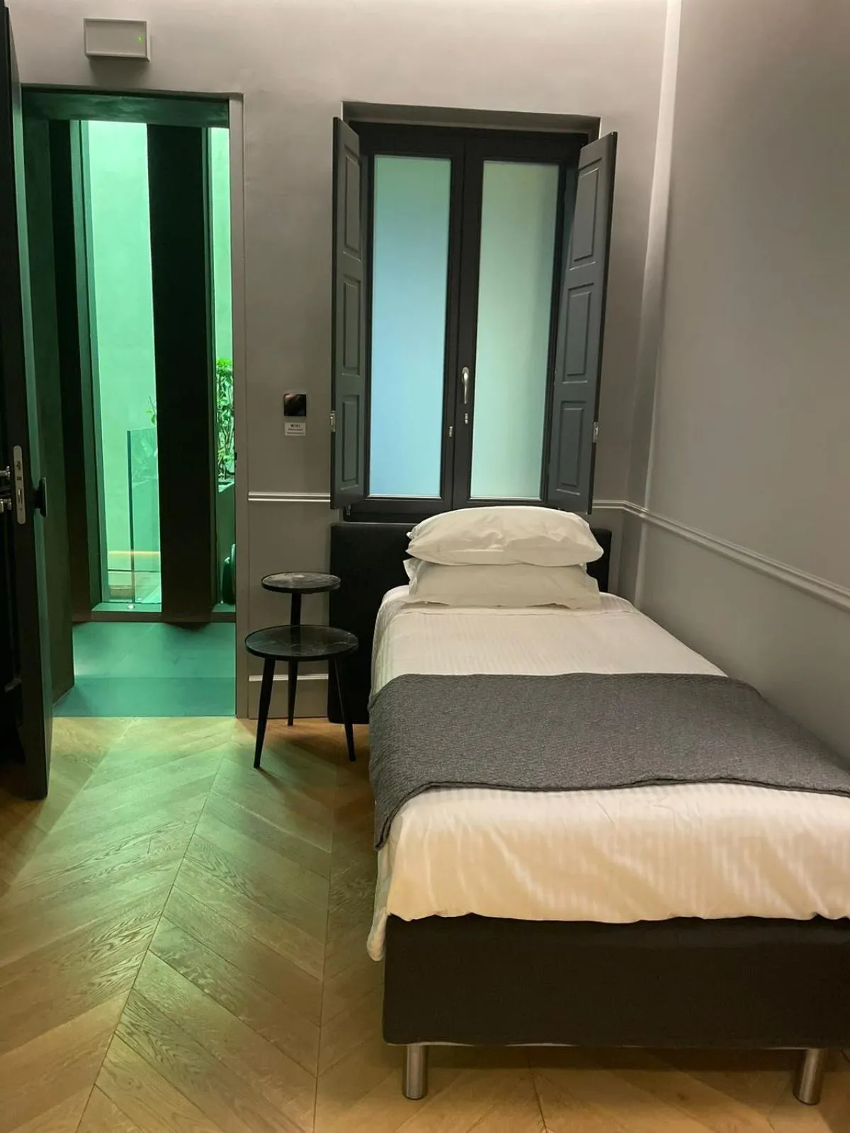 Bed in Nikiou Suites Luxury Residence