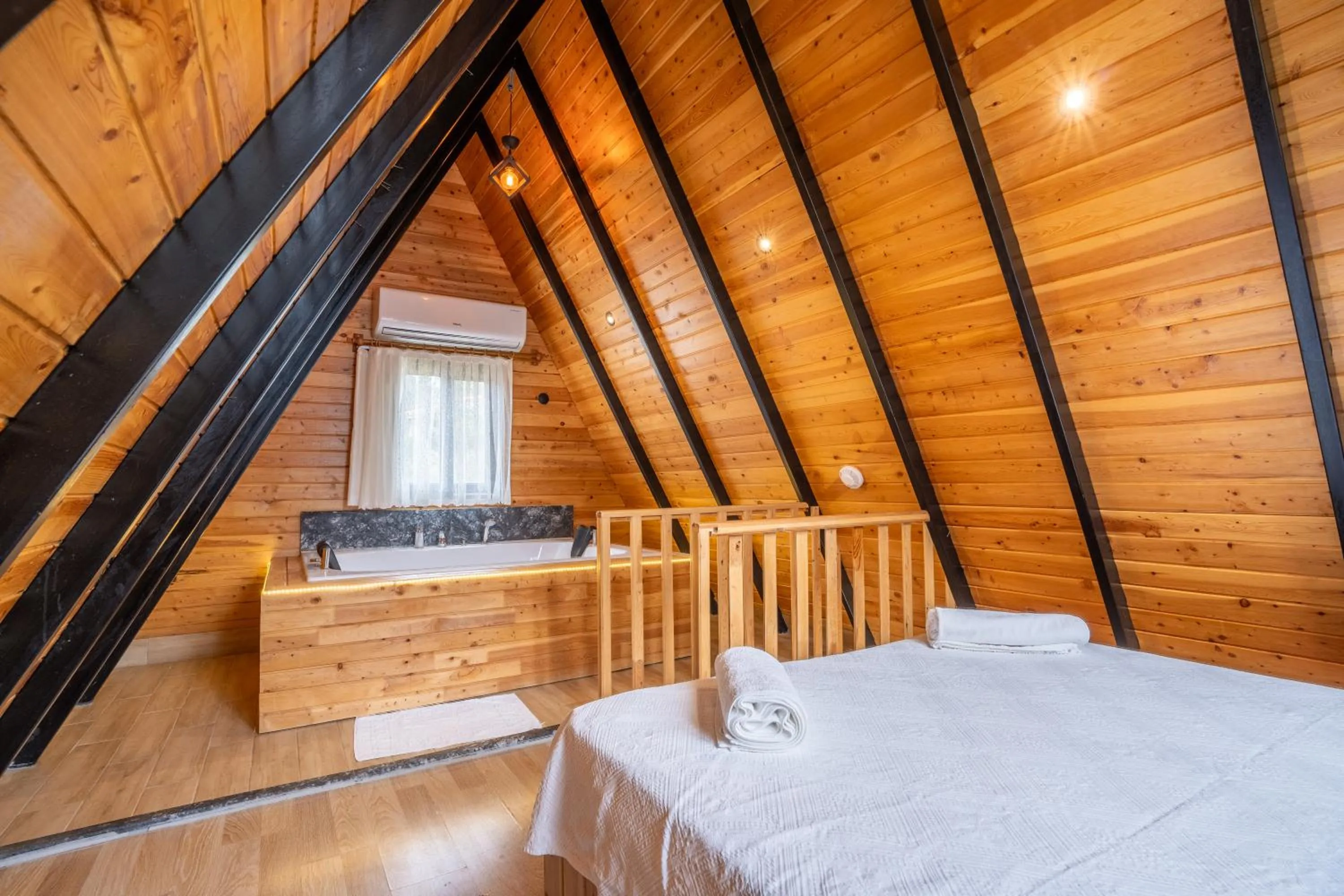 Bed in Karaöz Sapphire Bungalows