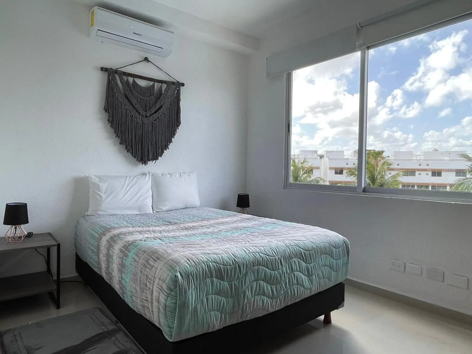 Bed in Yikal Suites by Andiani Travel