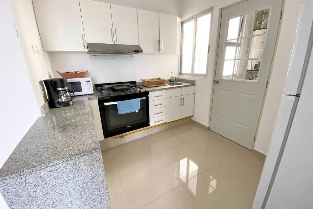 Kitchen or kitchenette in Yikal Suites by Andiani Travel