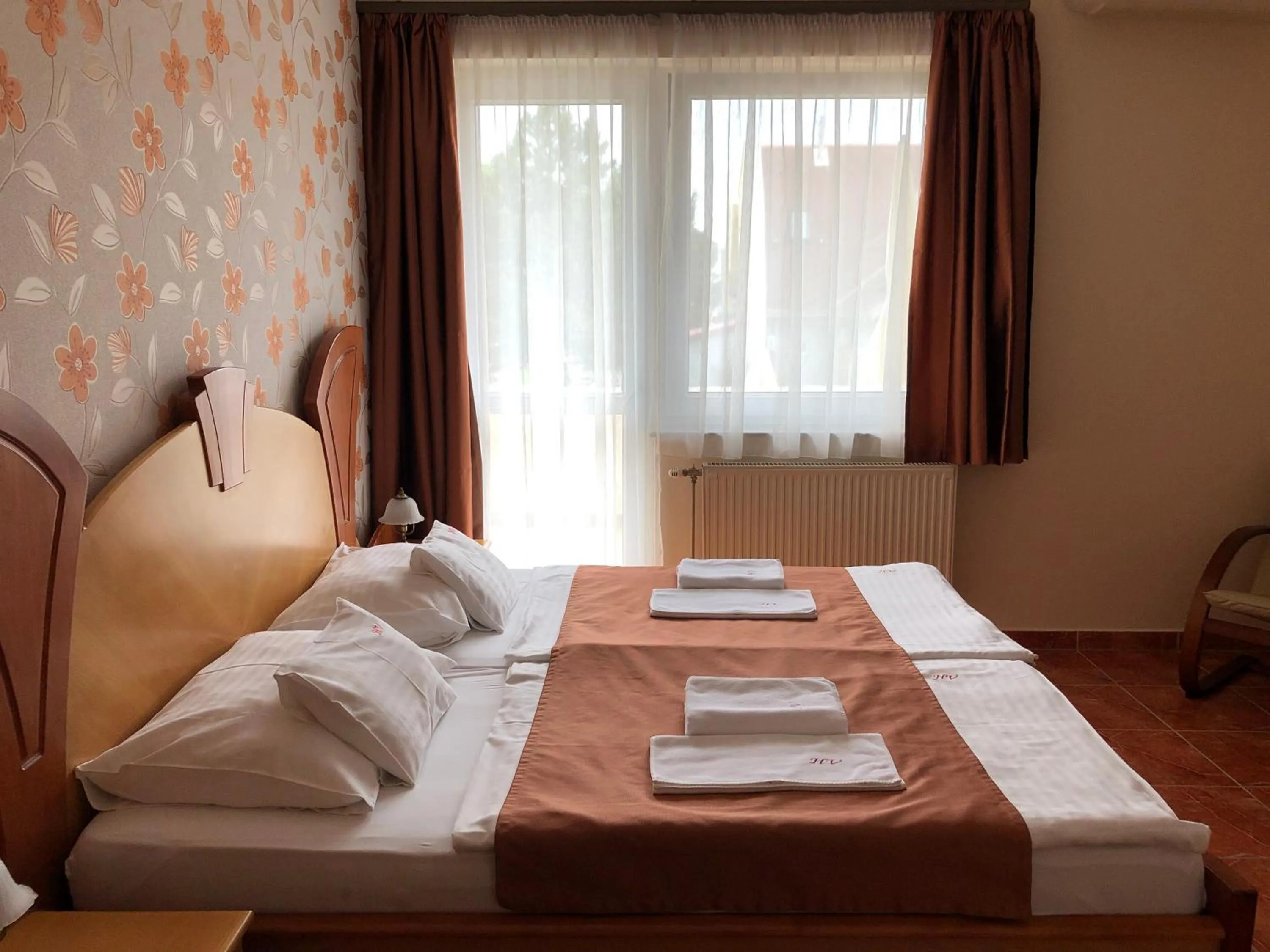 Bed in Hét Vezér Apartmanhotel