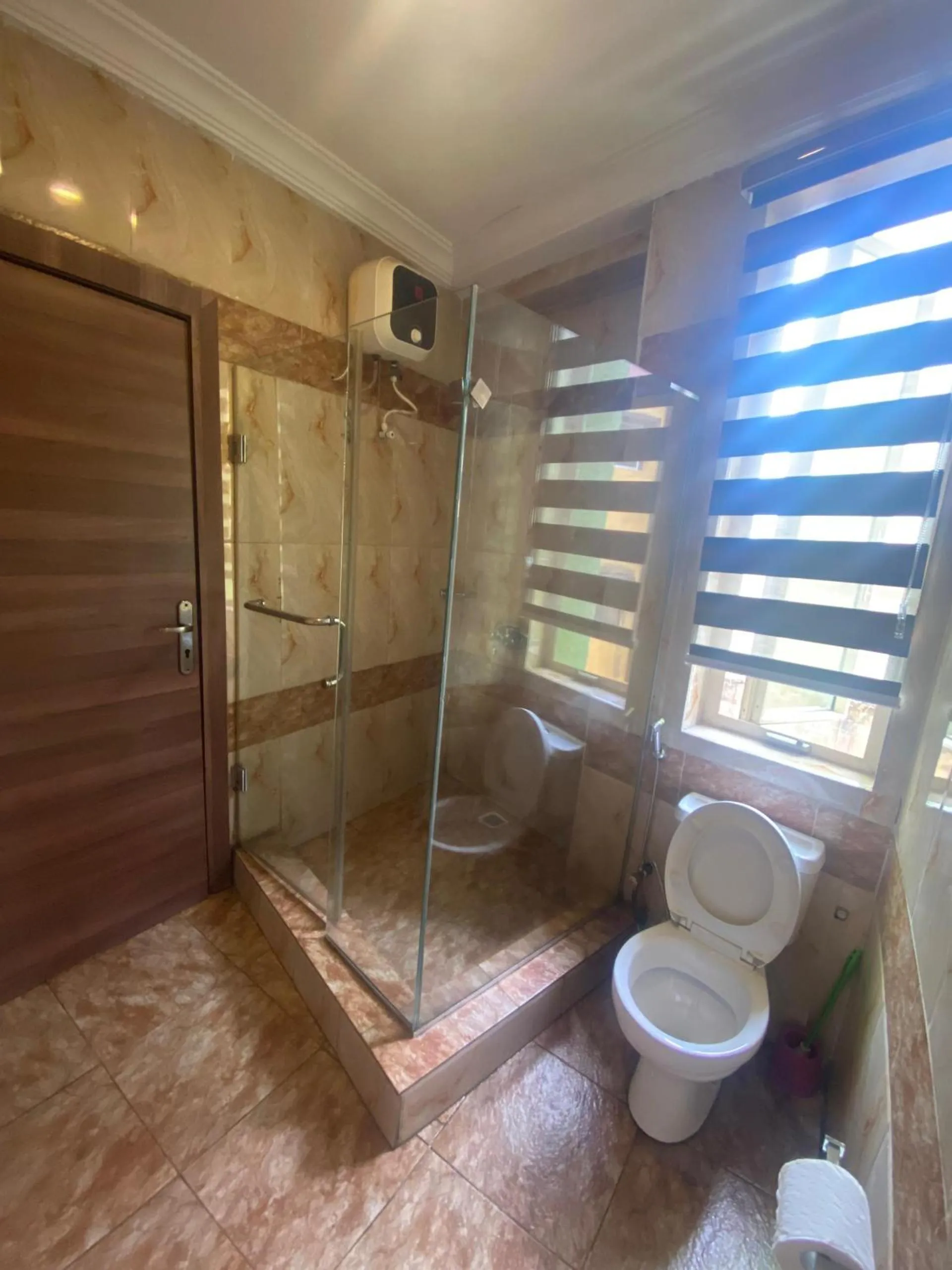 Toilet in Presken Hotel Alade, Ikeja