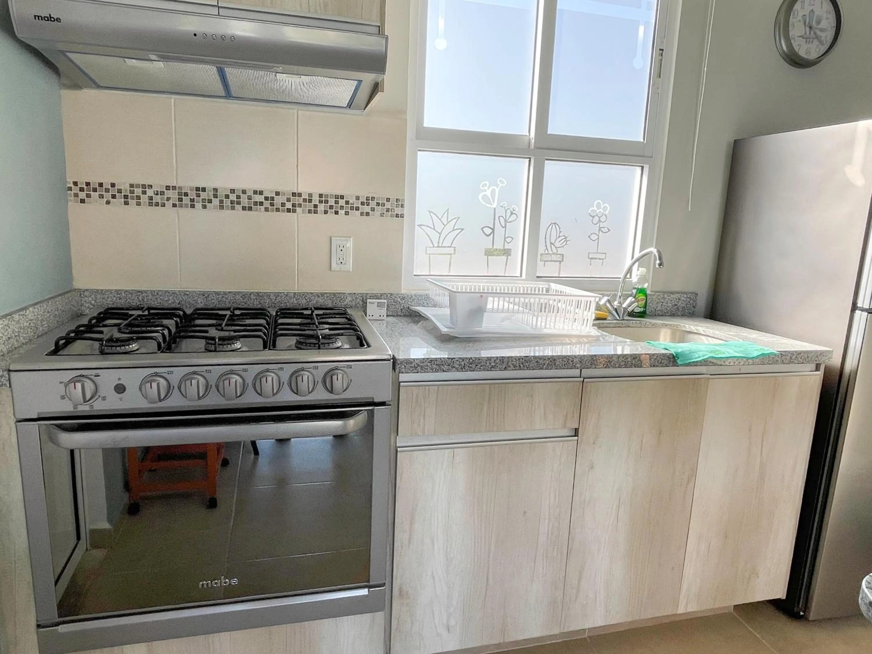 Kitchen or kitchenette in Dreams Lagoon by Andiani Travel